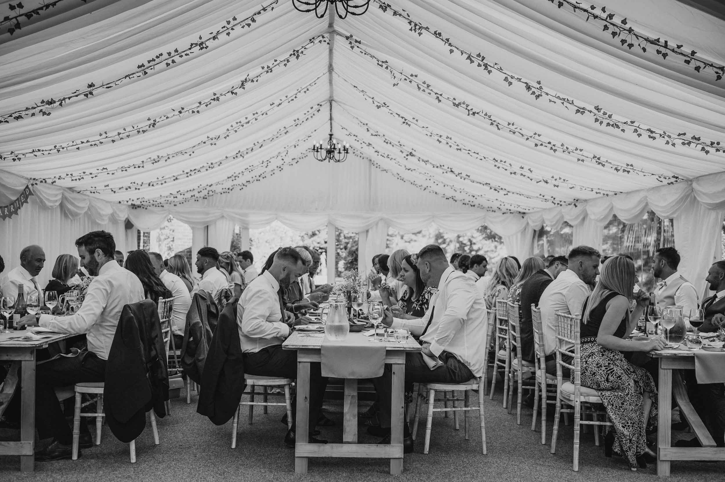 a wide shot of the guests eating