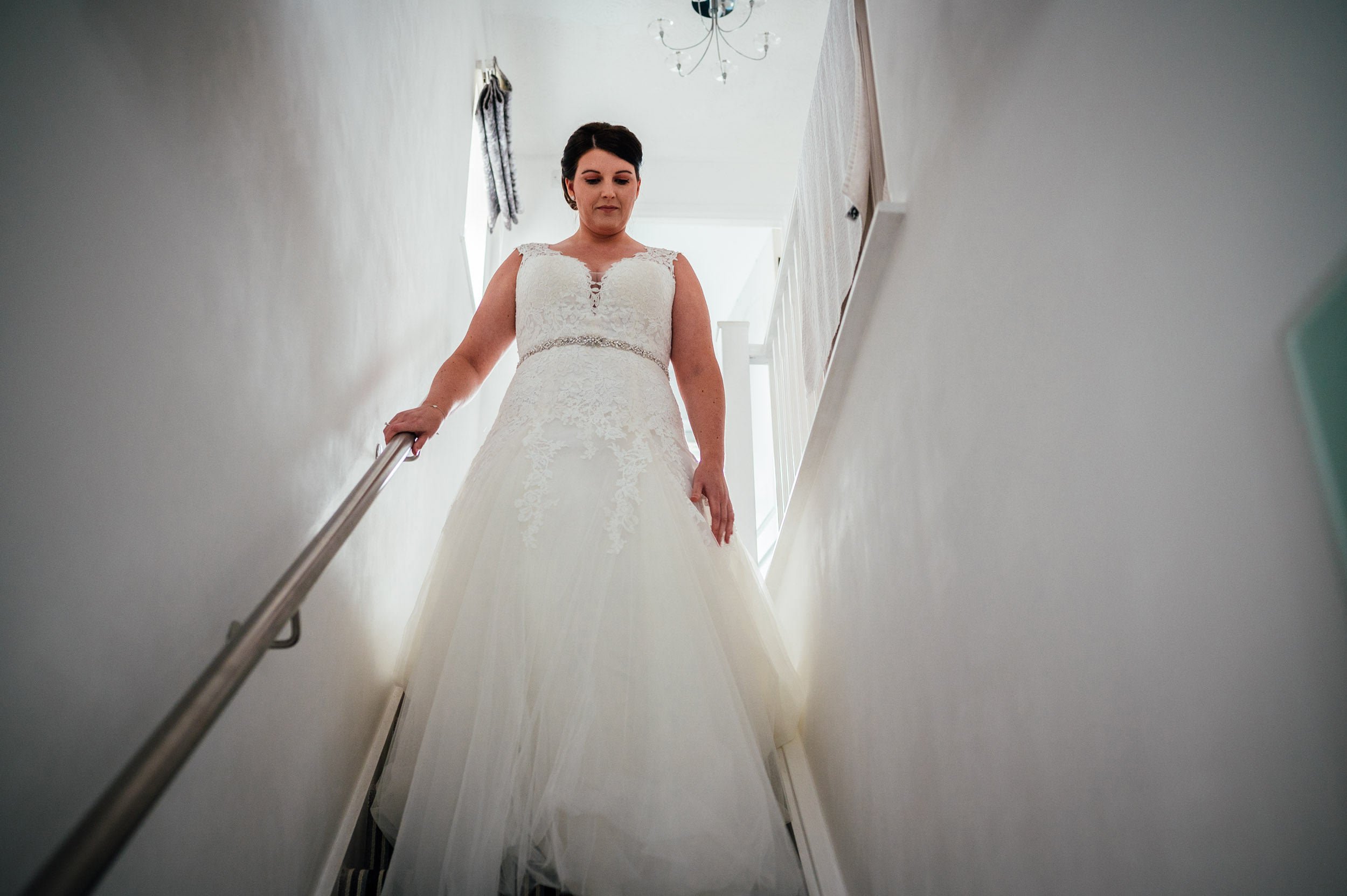 bride walking down the stairs