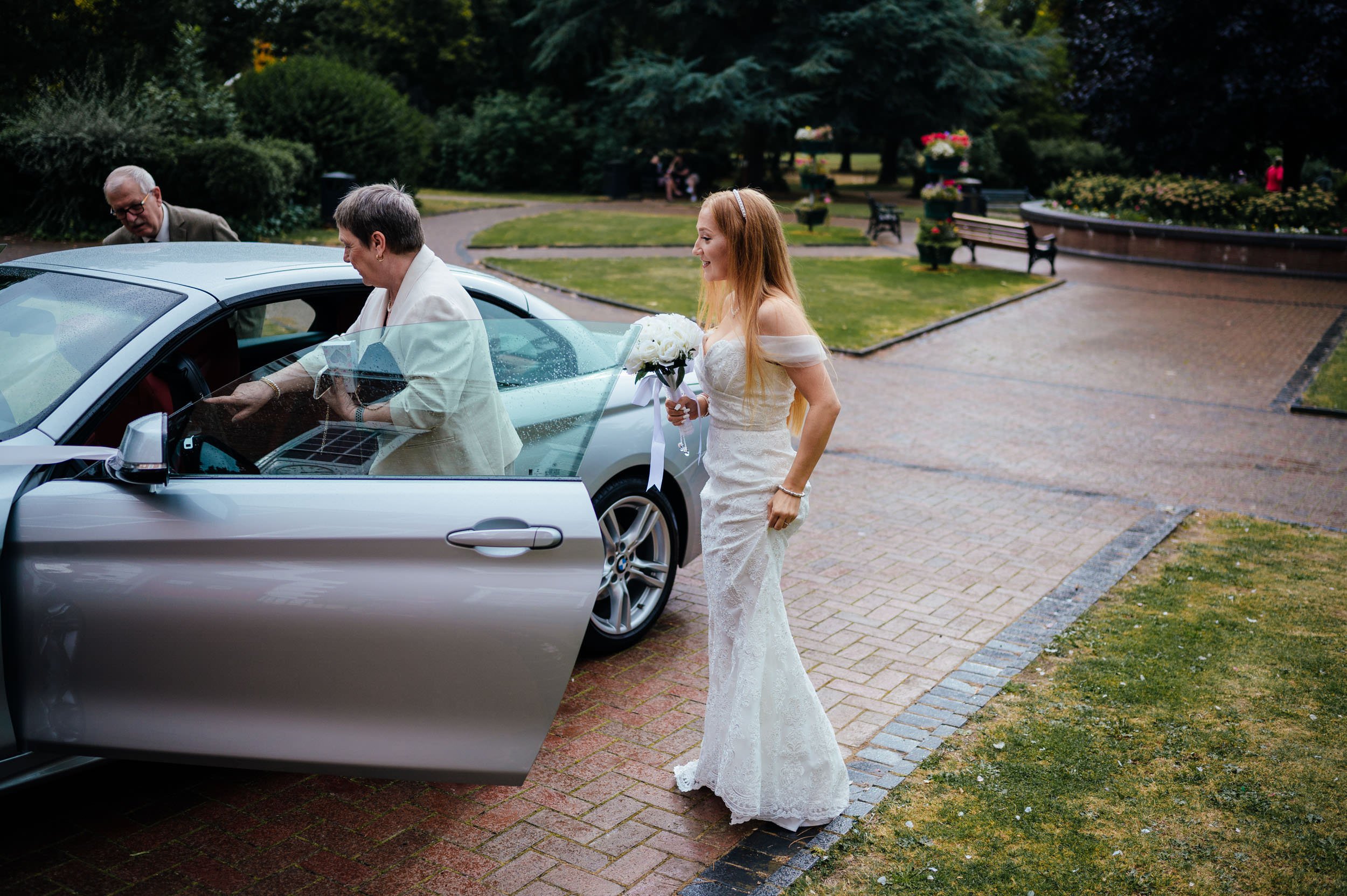 bride getting out of the car at brdgford hall