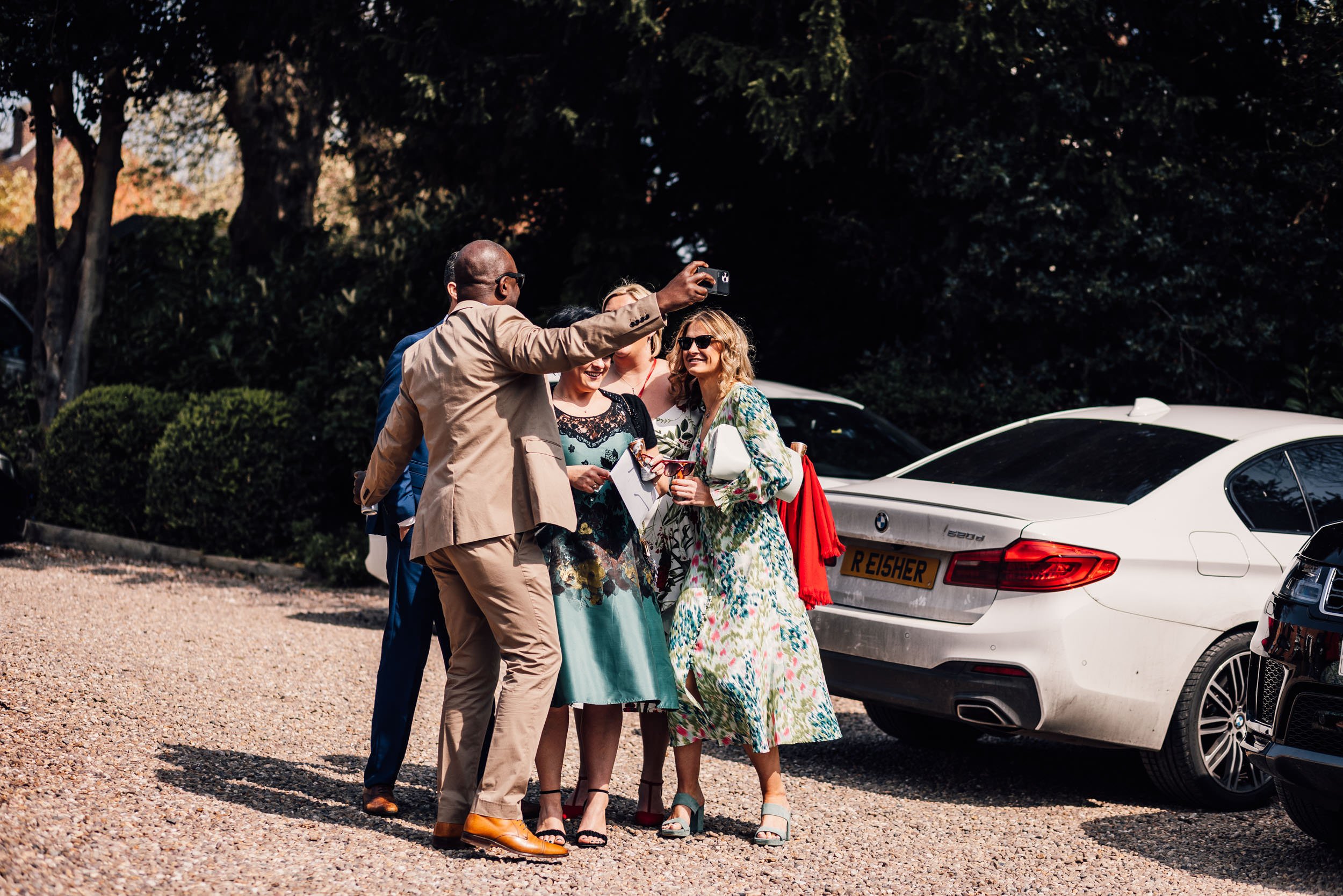 wedding guests taking a selfie