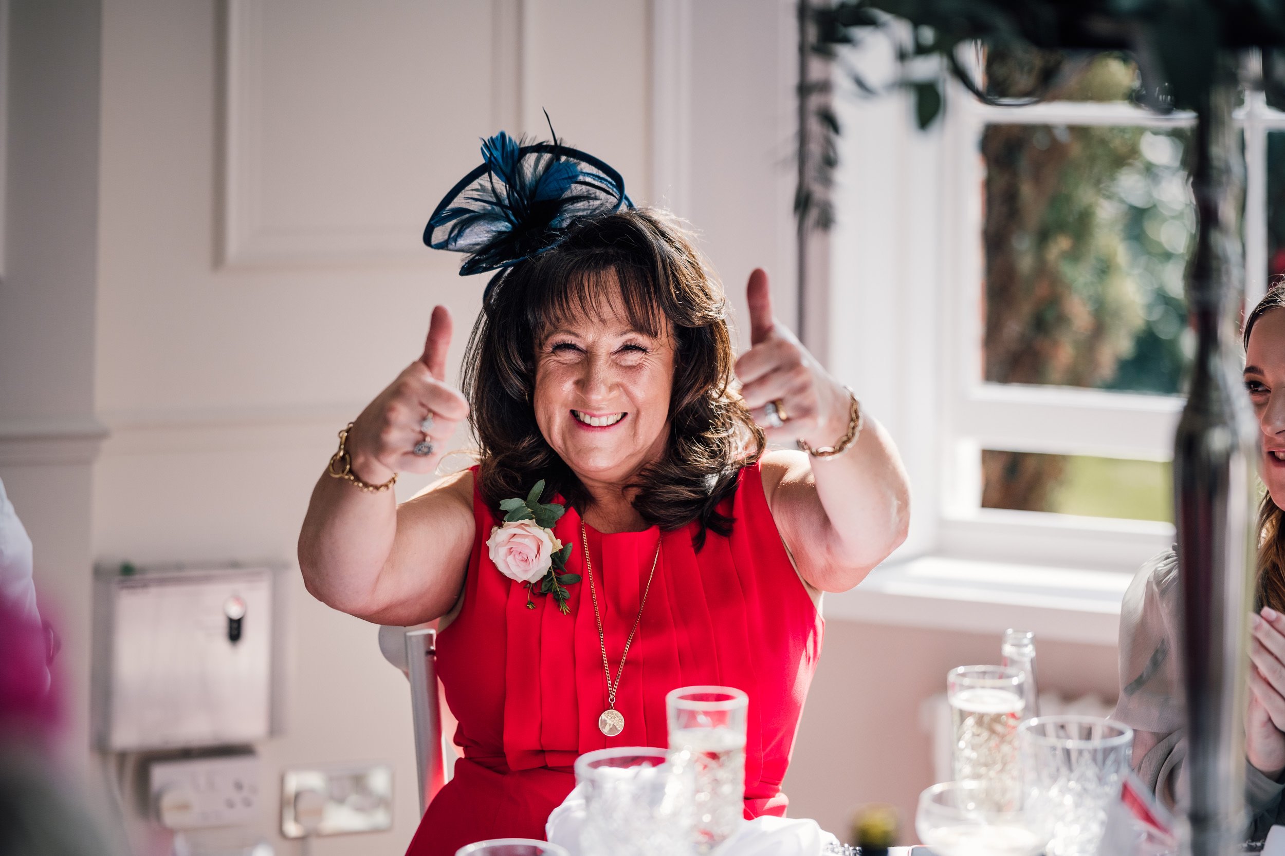 happy wedding guest during wedding breakfast