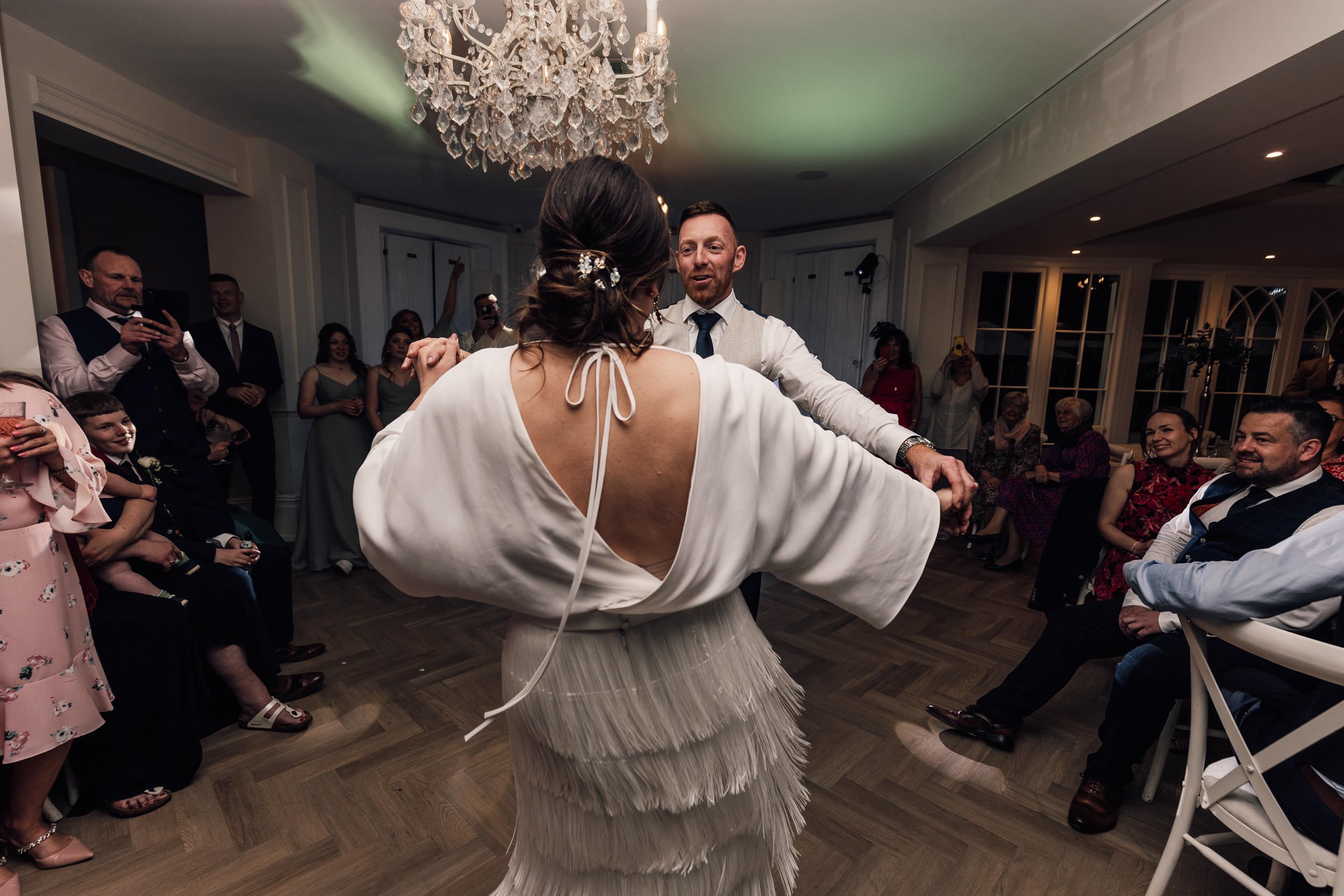 bride and groom dancing