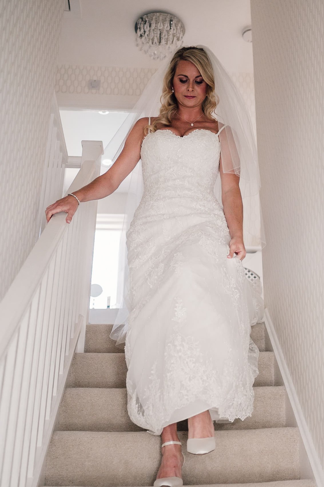 bride walking down the stairs