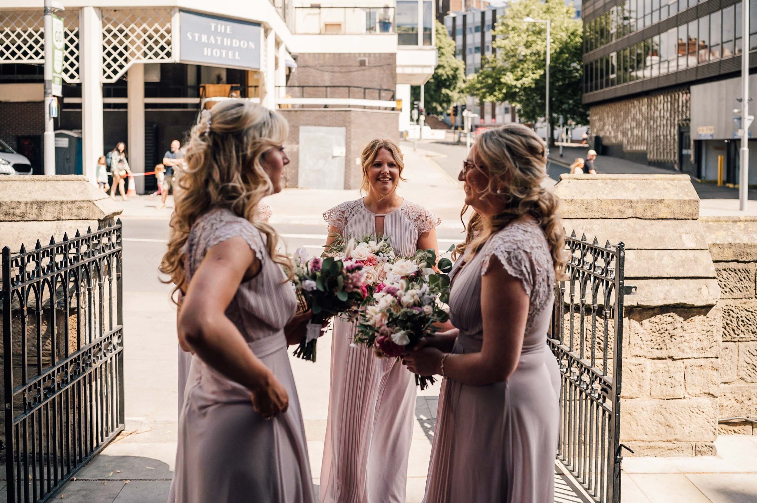 bridesmaids waiting for the bride at St Barnabas Cathedral, Nottingham