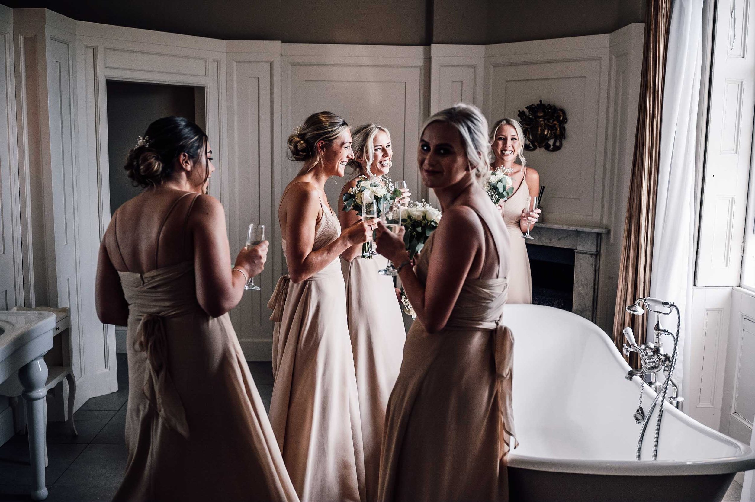 bridesmaids talking at Hodsock Priory