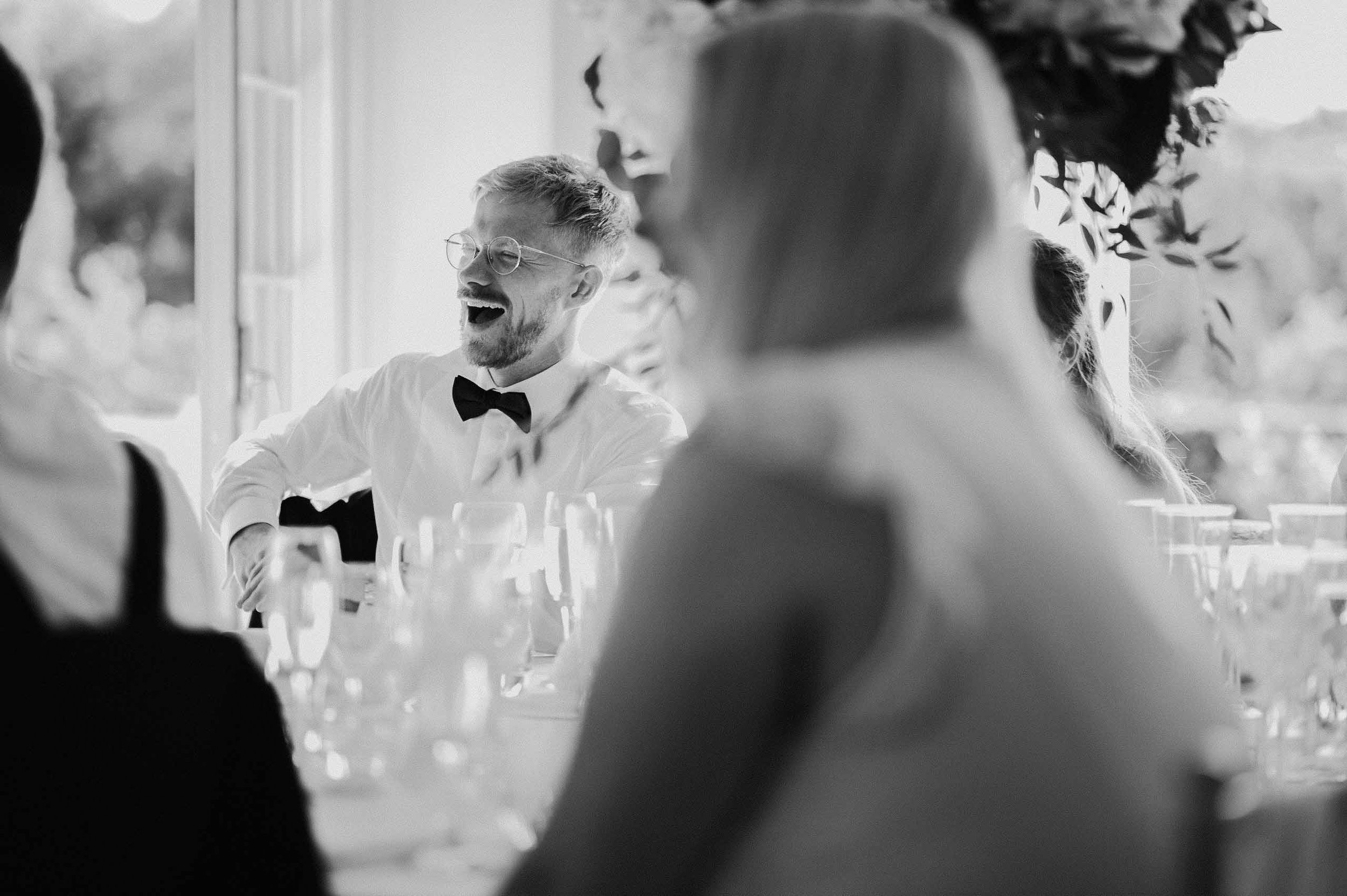 Guests enjoying the wedding speeches at Hodsock Priory