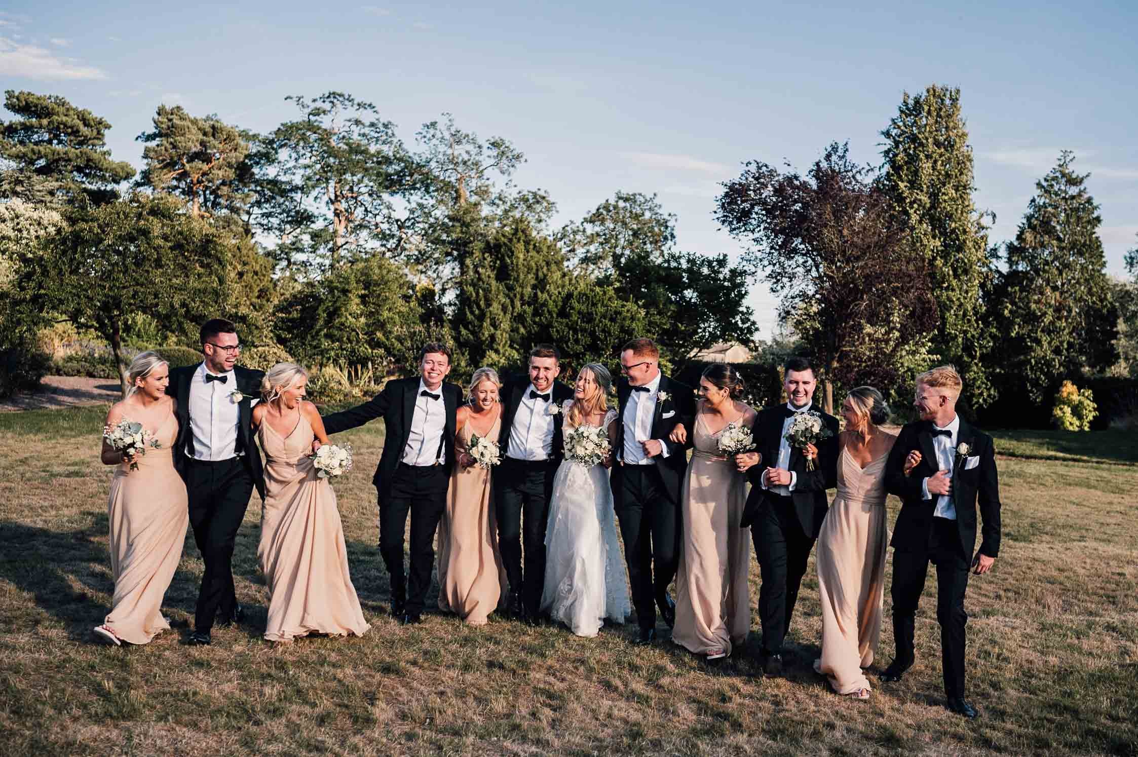 Bridal party having fun at Hodsock Priory wedding