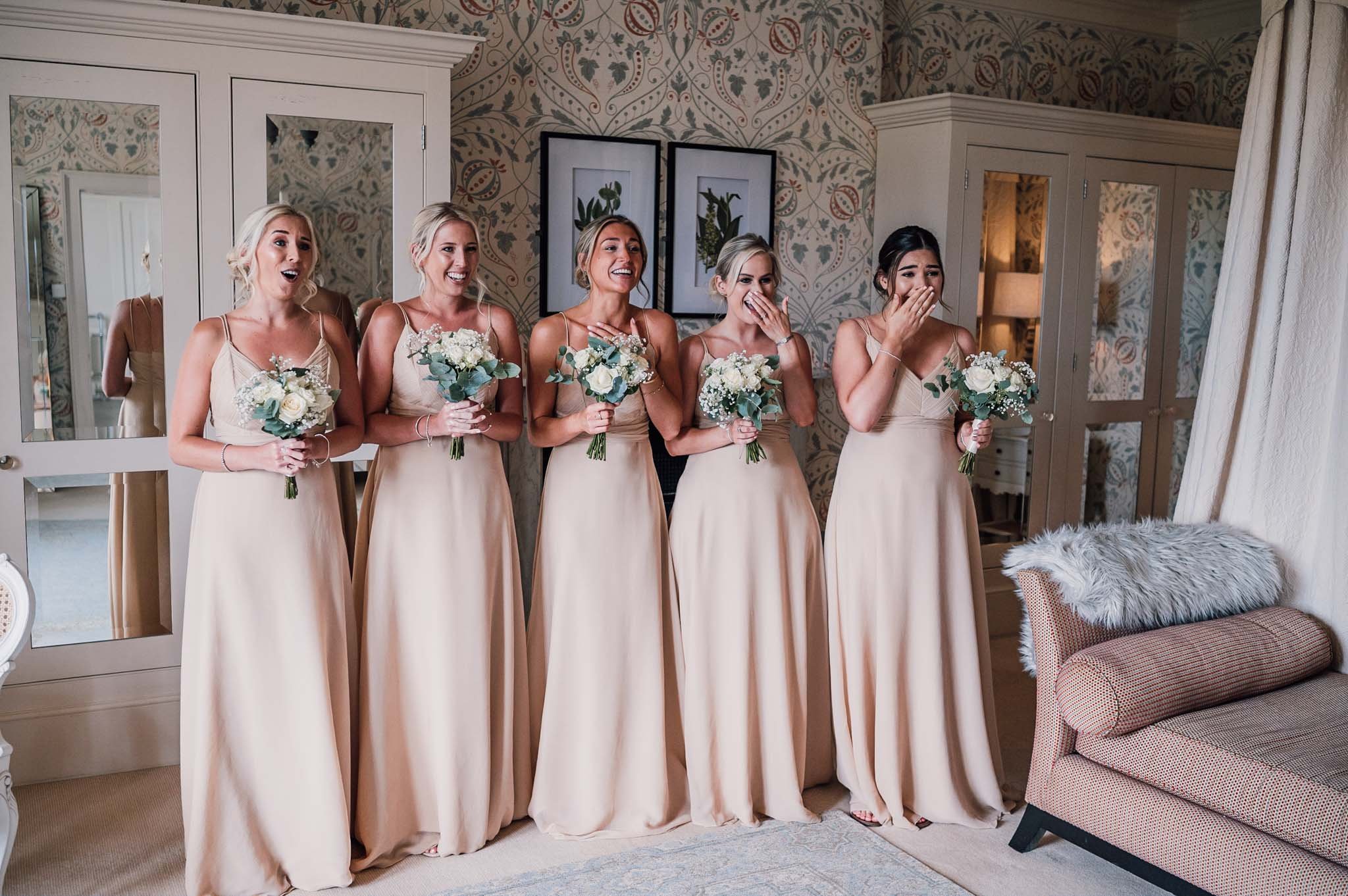 bridesmaids reactions to seeing the bride at Hodsock Priory