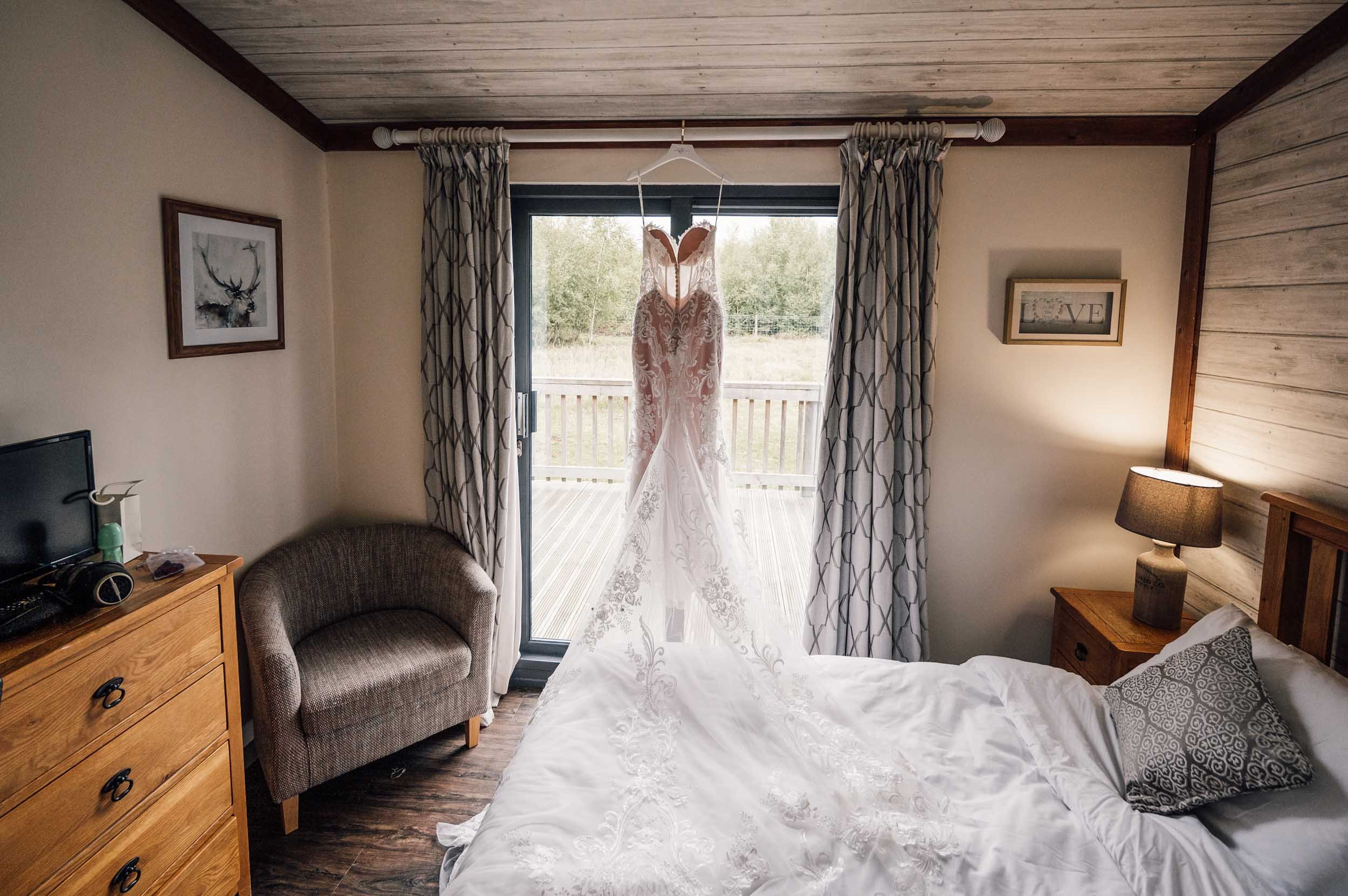 wedding gown hung up