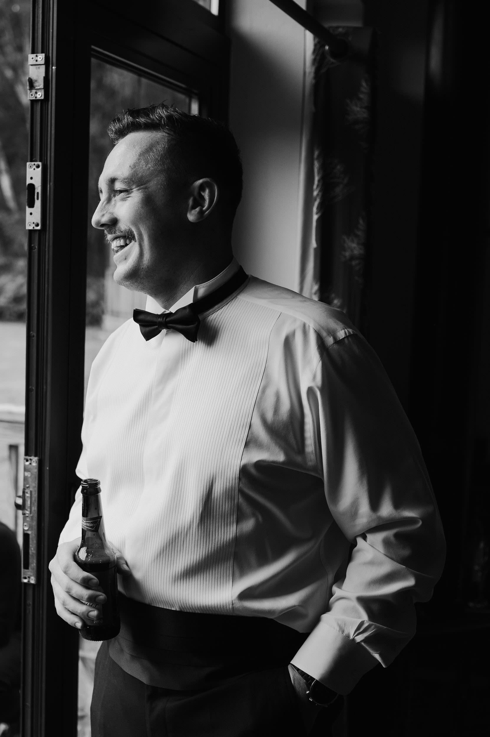 groomsman laughing