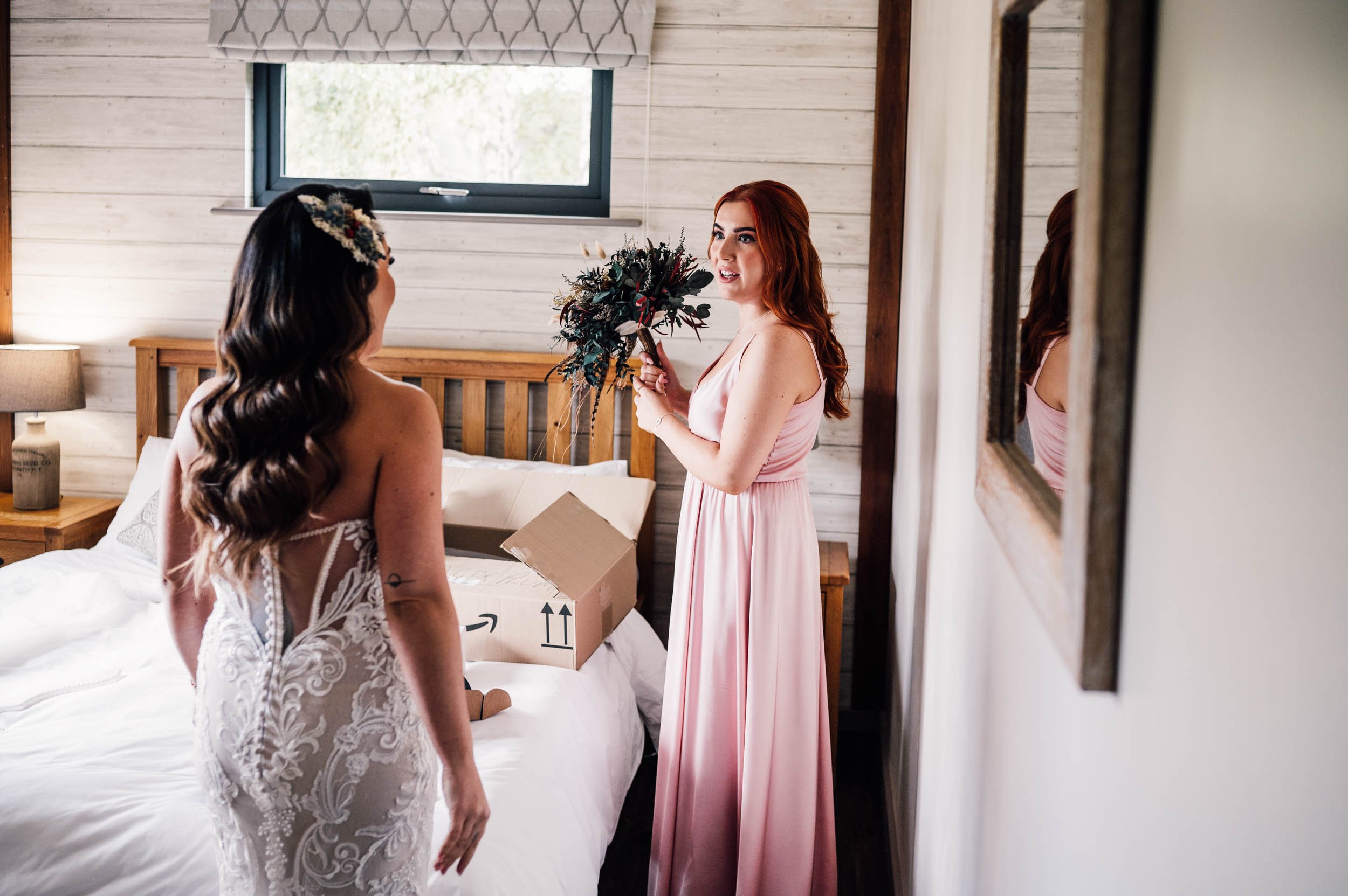 bride and bridesmaid talking