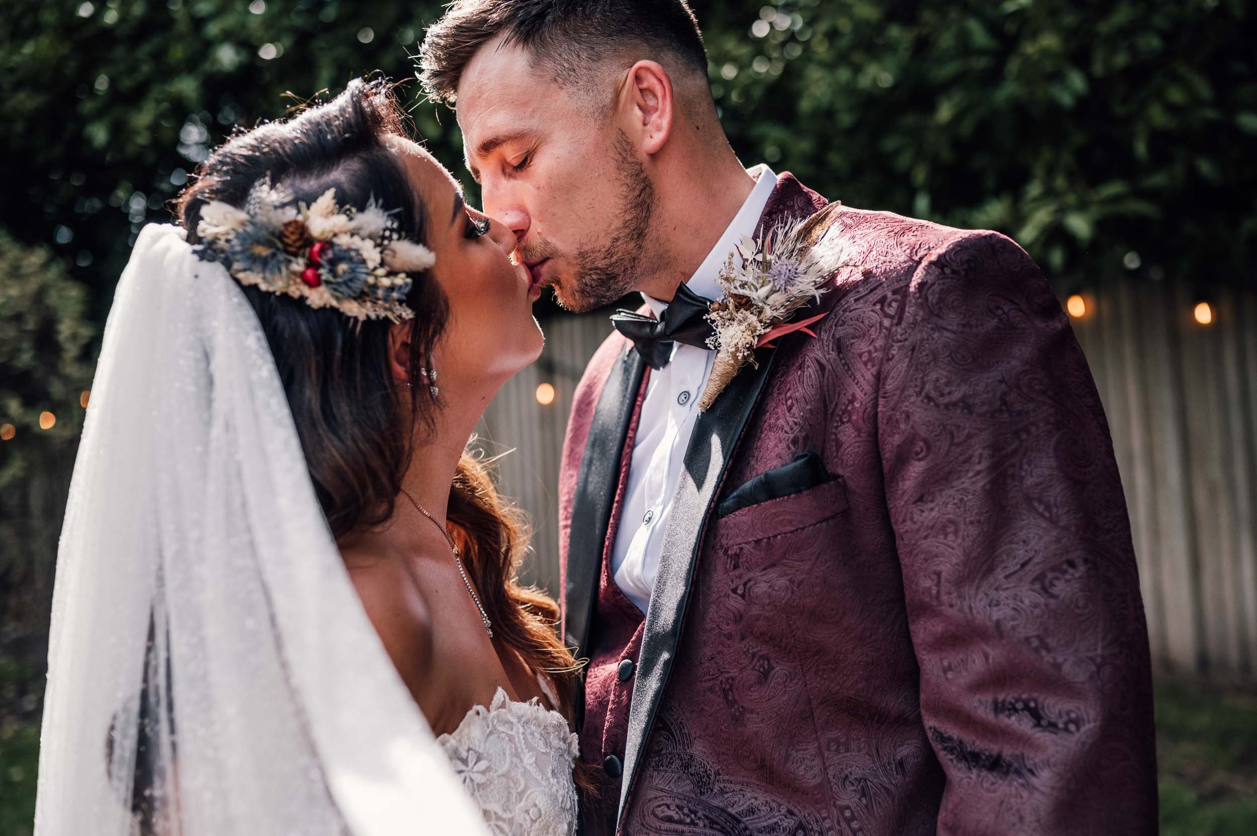 bride and groom kissing