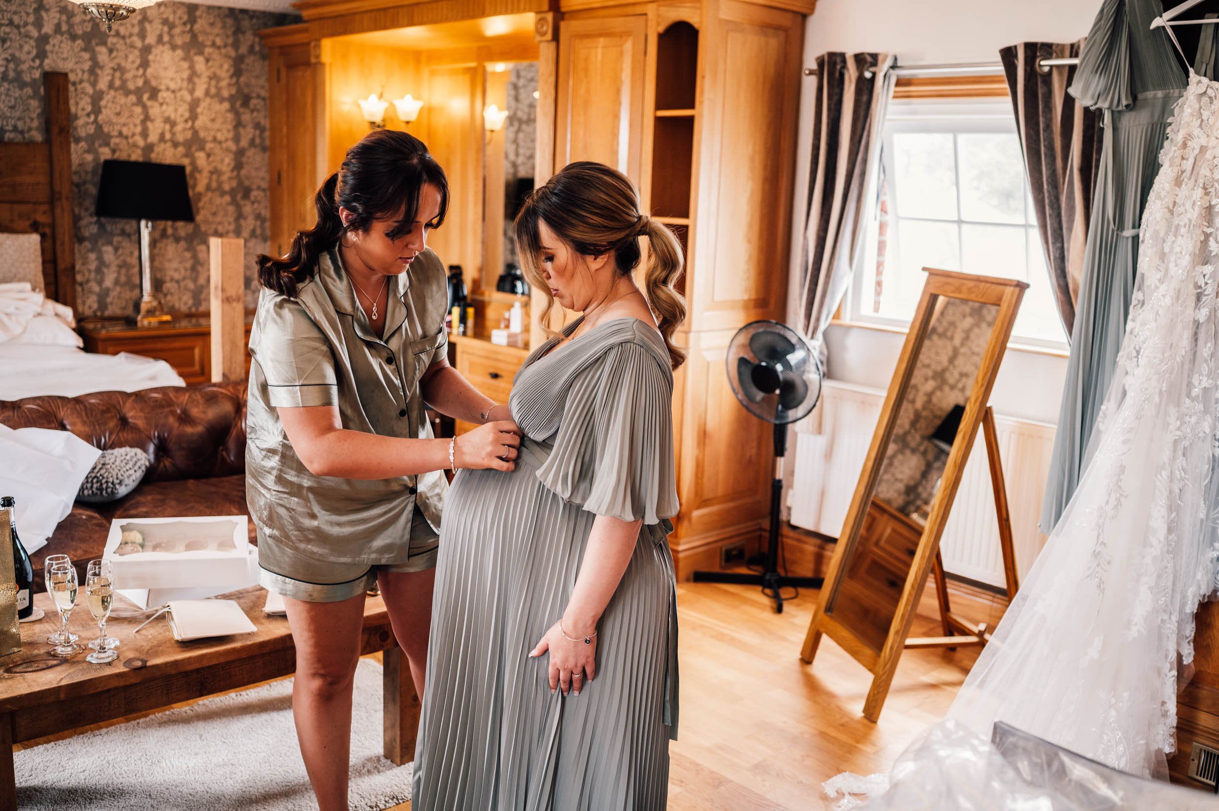 bridesmaids getting dressed