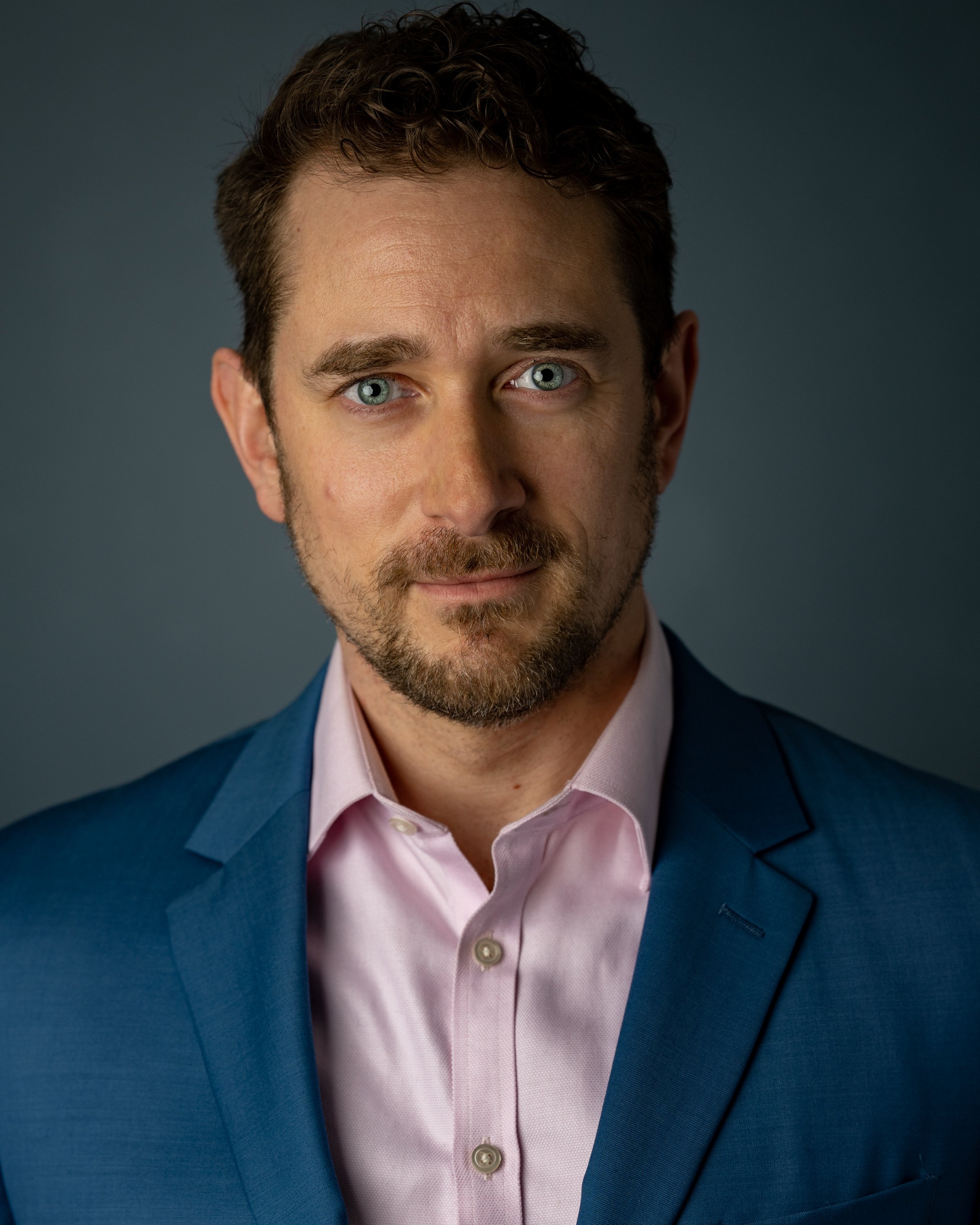 Christopher Hwerbert headshot 2023 blue suit print.jpeg