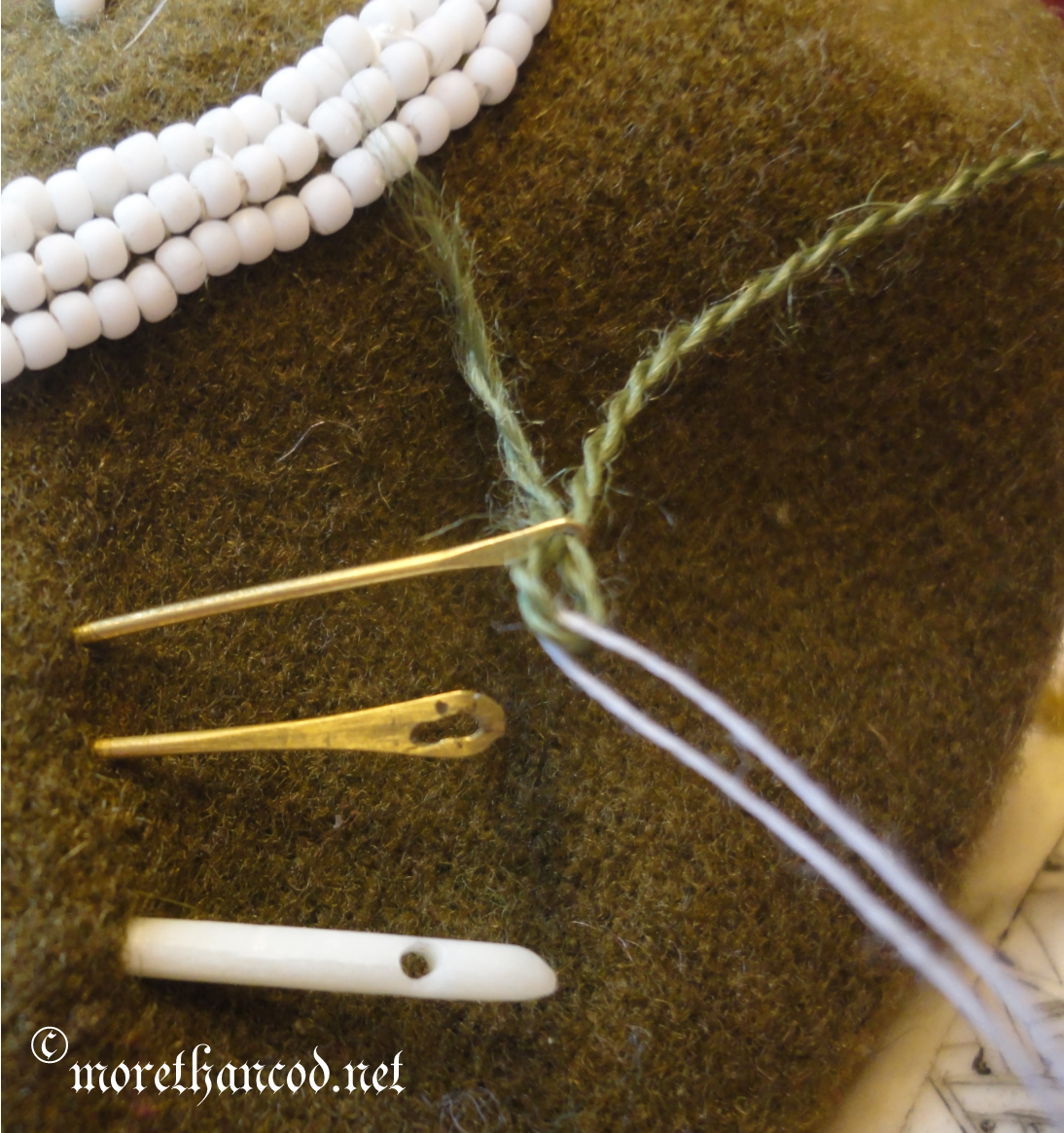 ...Then, pull Sewing thread through.