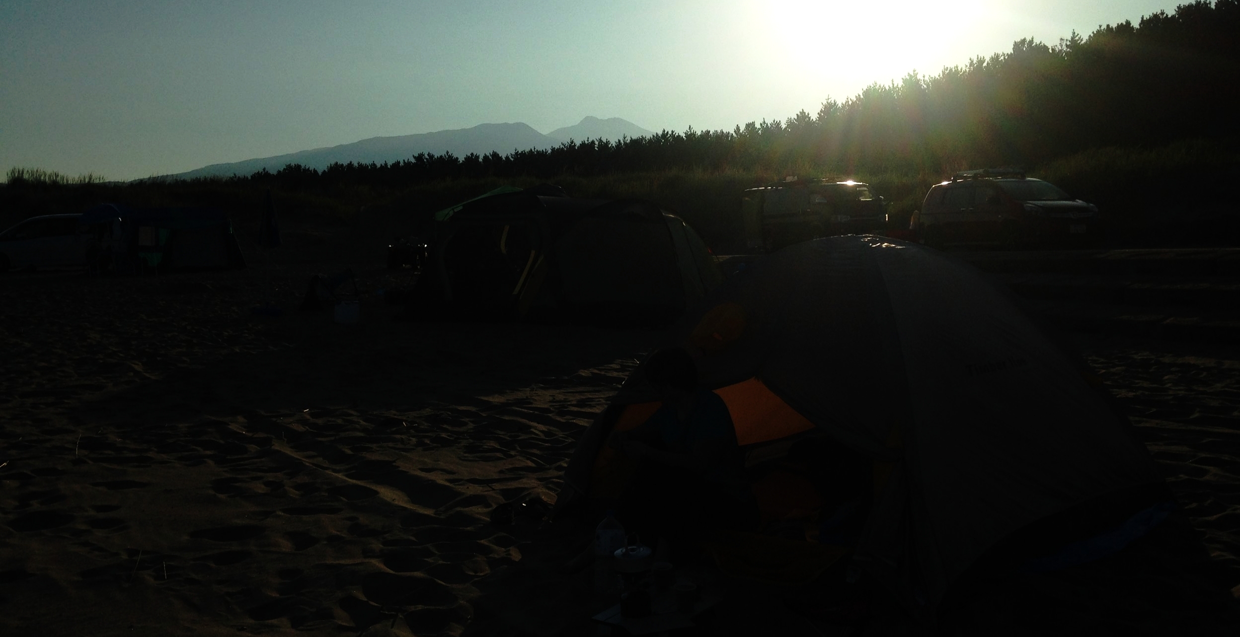 Some mornings are better than others; waking up on the beach at Yuza, in view of the peak.