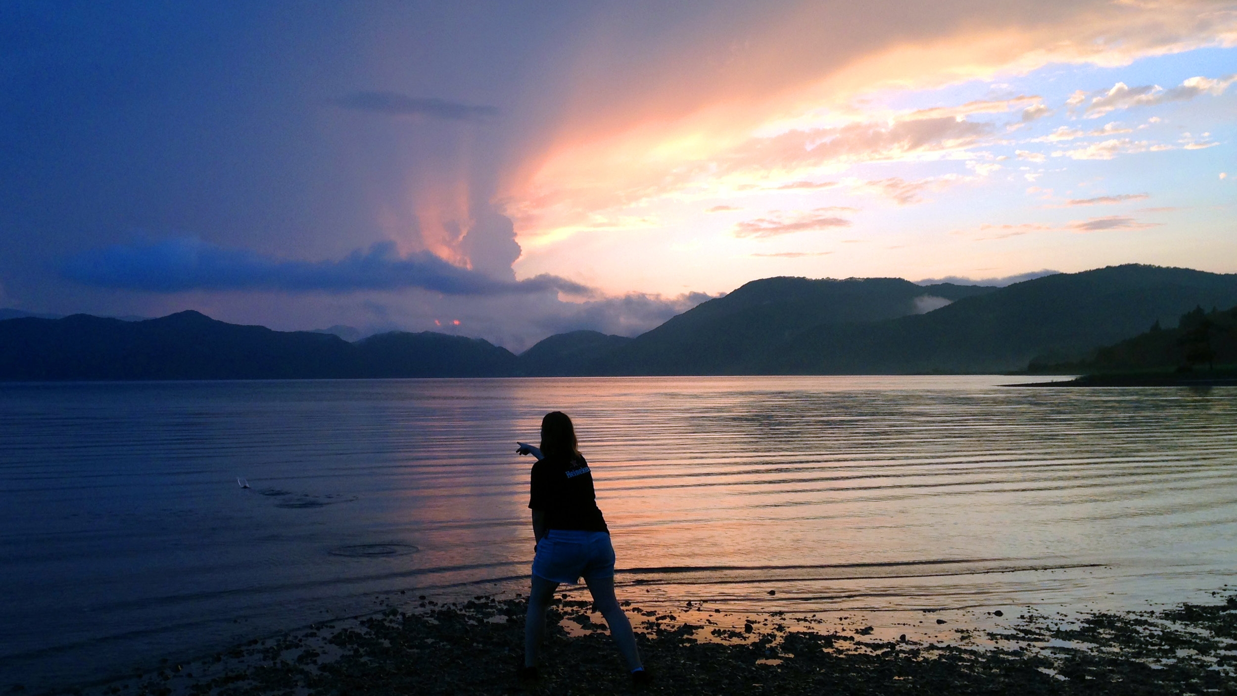 Skimming stones on Lake Tazawa at a perfect dusk.