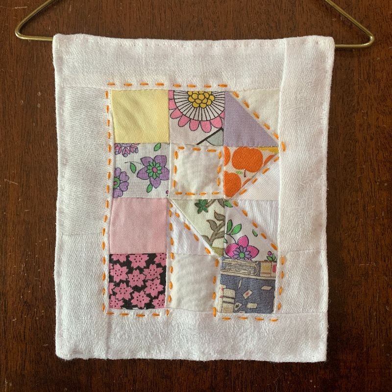 Baby name initial tiny quilt wall hanging handmade in Ireland by Saturn Cottage Industries 800x800.jpg