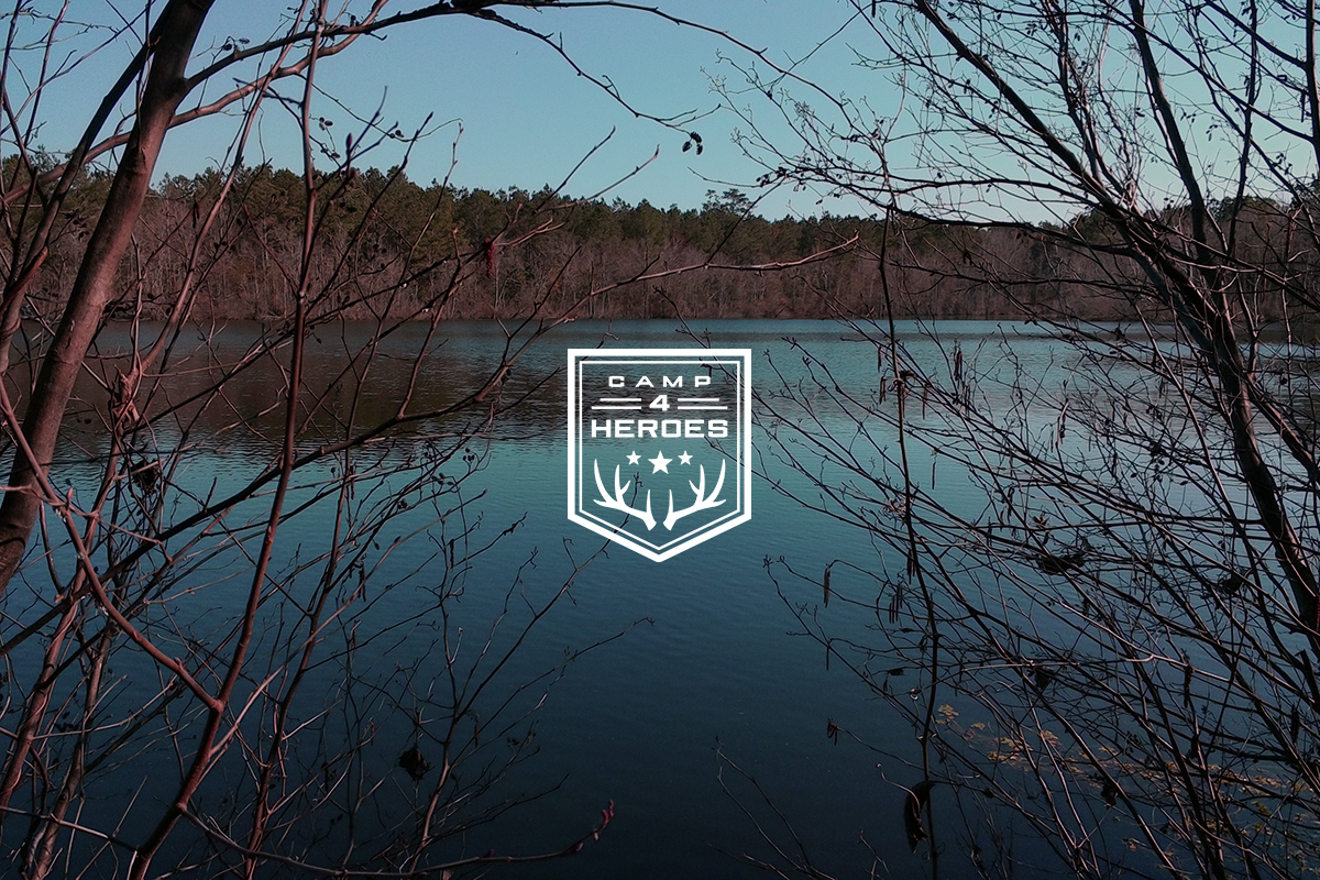 Final overlay version of logo, placed over Camp 4 Heroes location photography for use on social media and advertisments