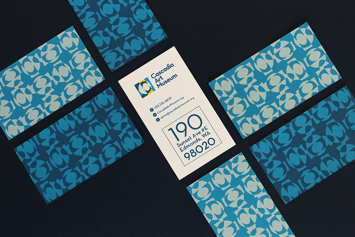 Business cards featuring custom pattern based on the logo as well as significant tile structures within the CAM galleries
