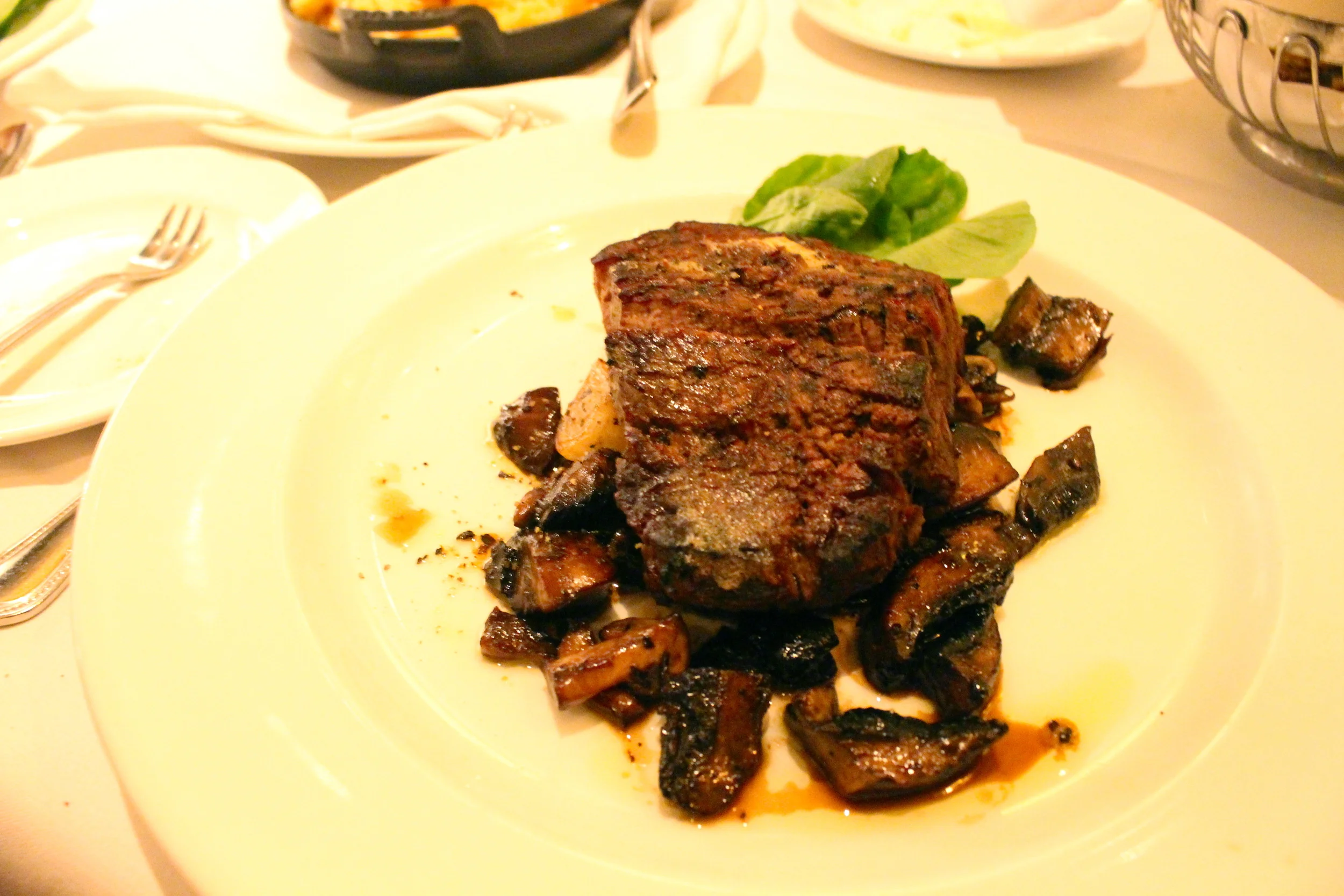 Sliced Filet Mignon with Cipollini Onions and Wild Mushrooms