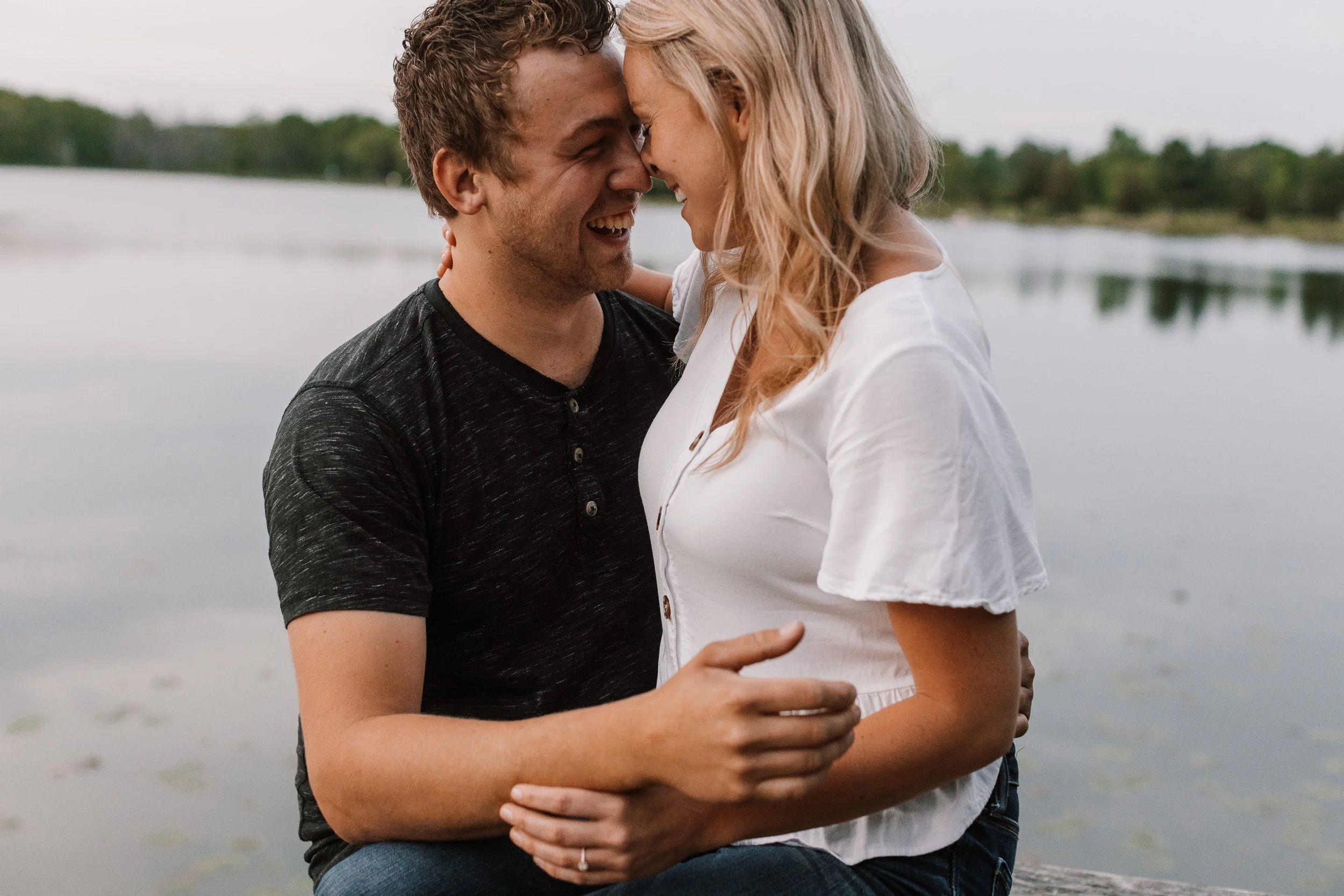 Couple shares a laugh during their niagara engagement session.jpg