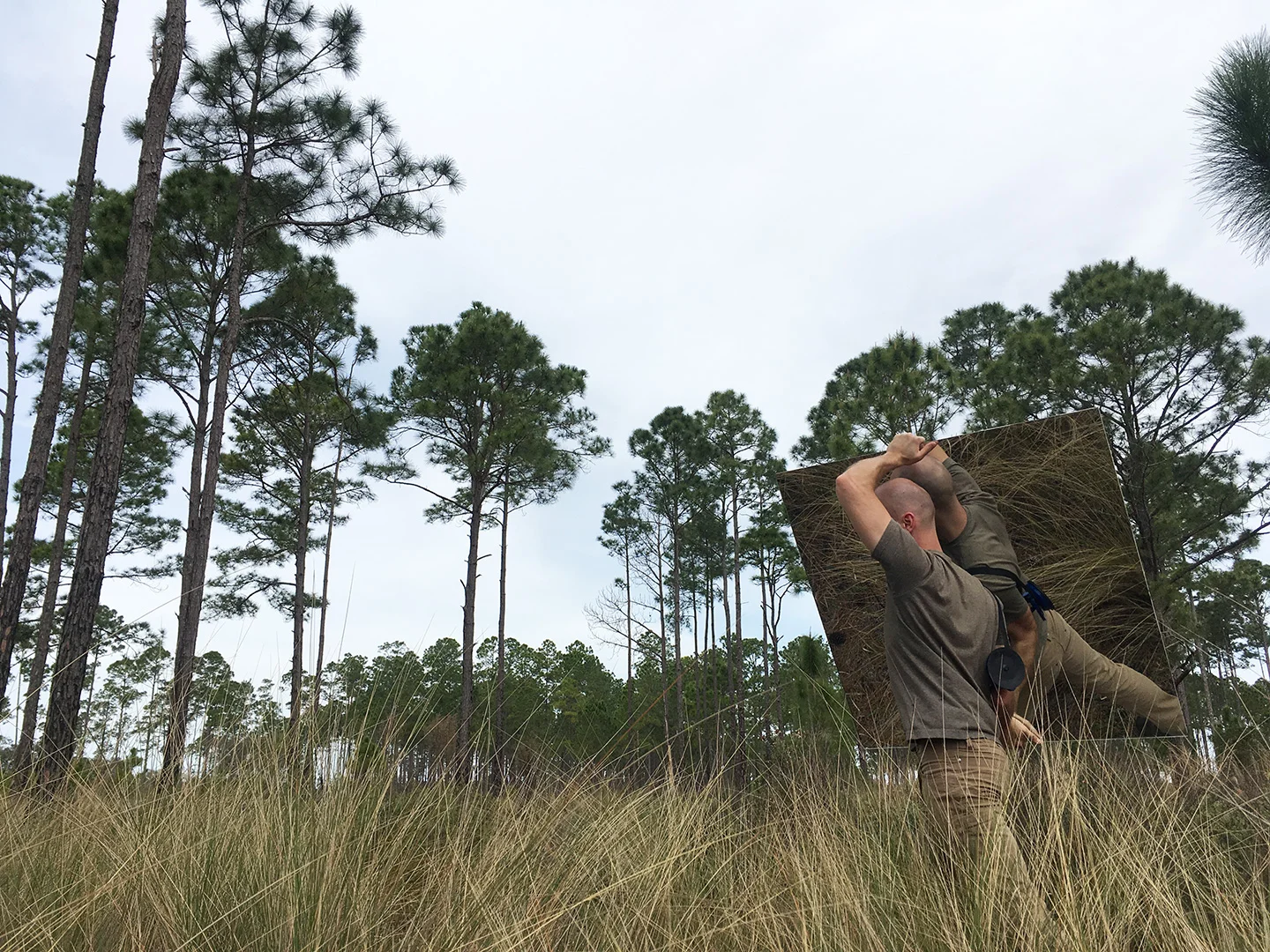 Me carrying the mirror in the Juniper Prairie Wilderness. Photo by Alex Catalano.