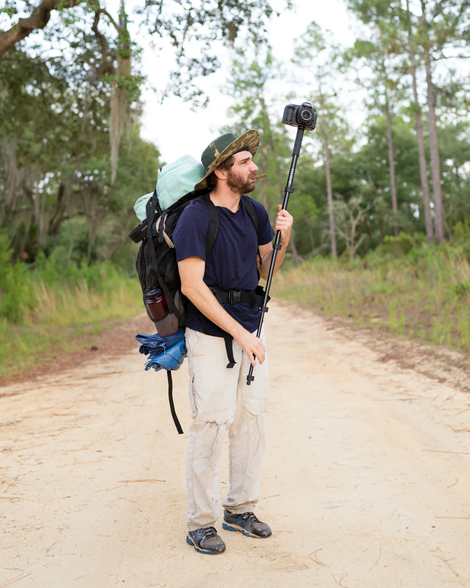 Alex pauses for a portrait in the middle of Forest Road 46 before hiking south into the Juniper Prairie Wilderness.