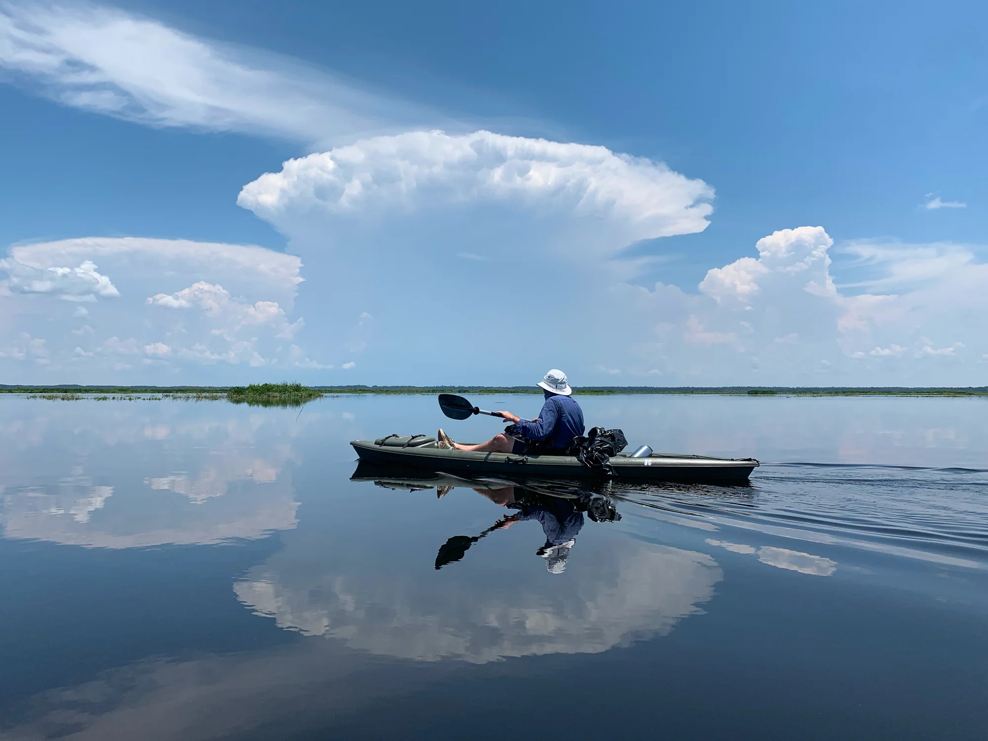 A large storm looms in the distance during our paddle out to the La Chua Trail observation platform in Paynes Prairie Preserve.