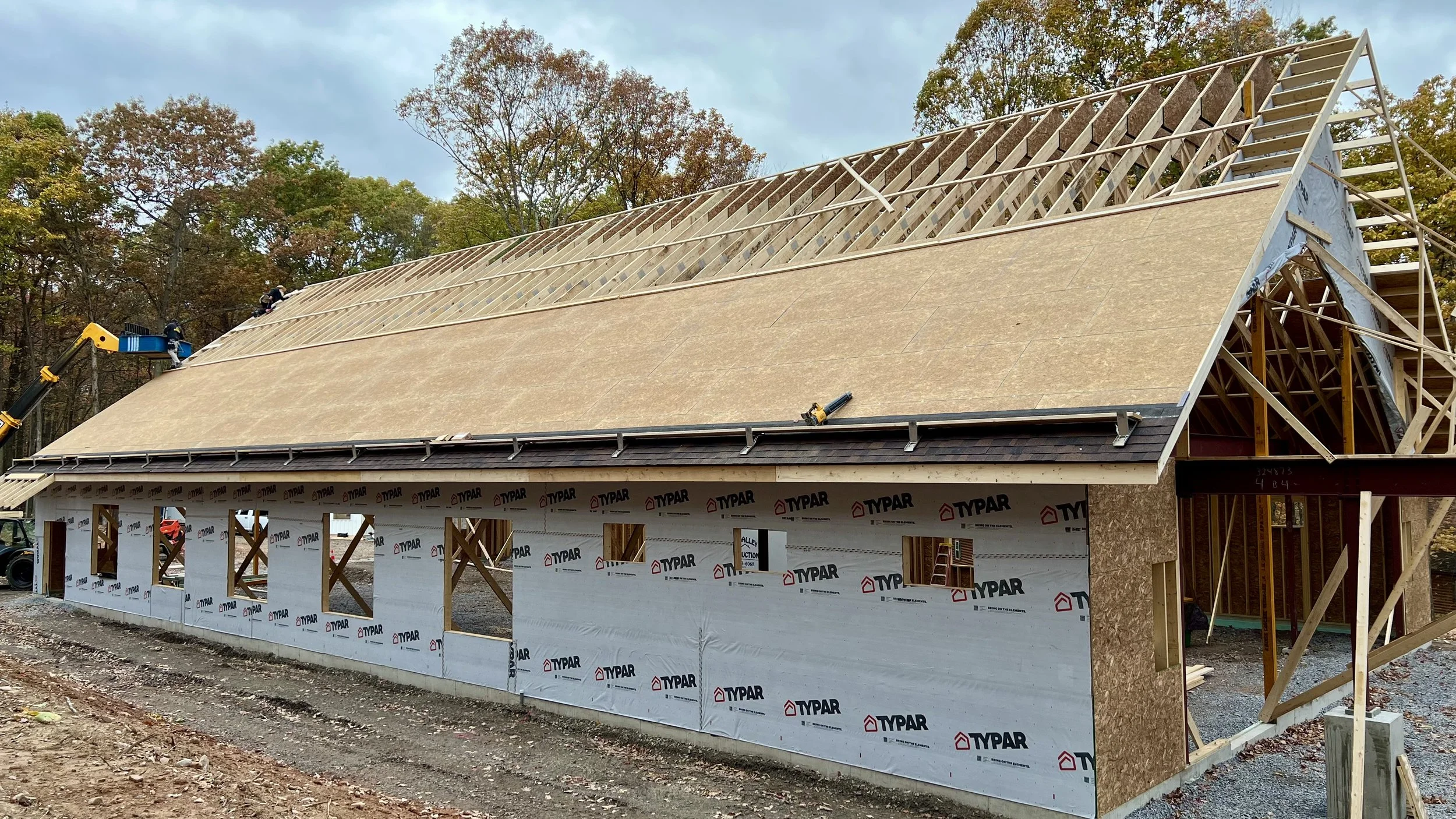 Oct. 23 - Roof sheeting continues.