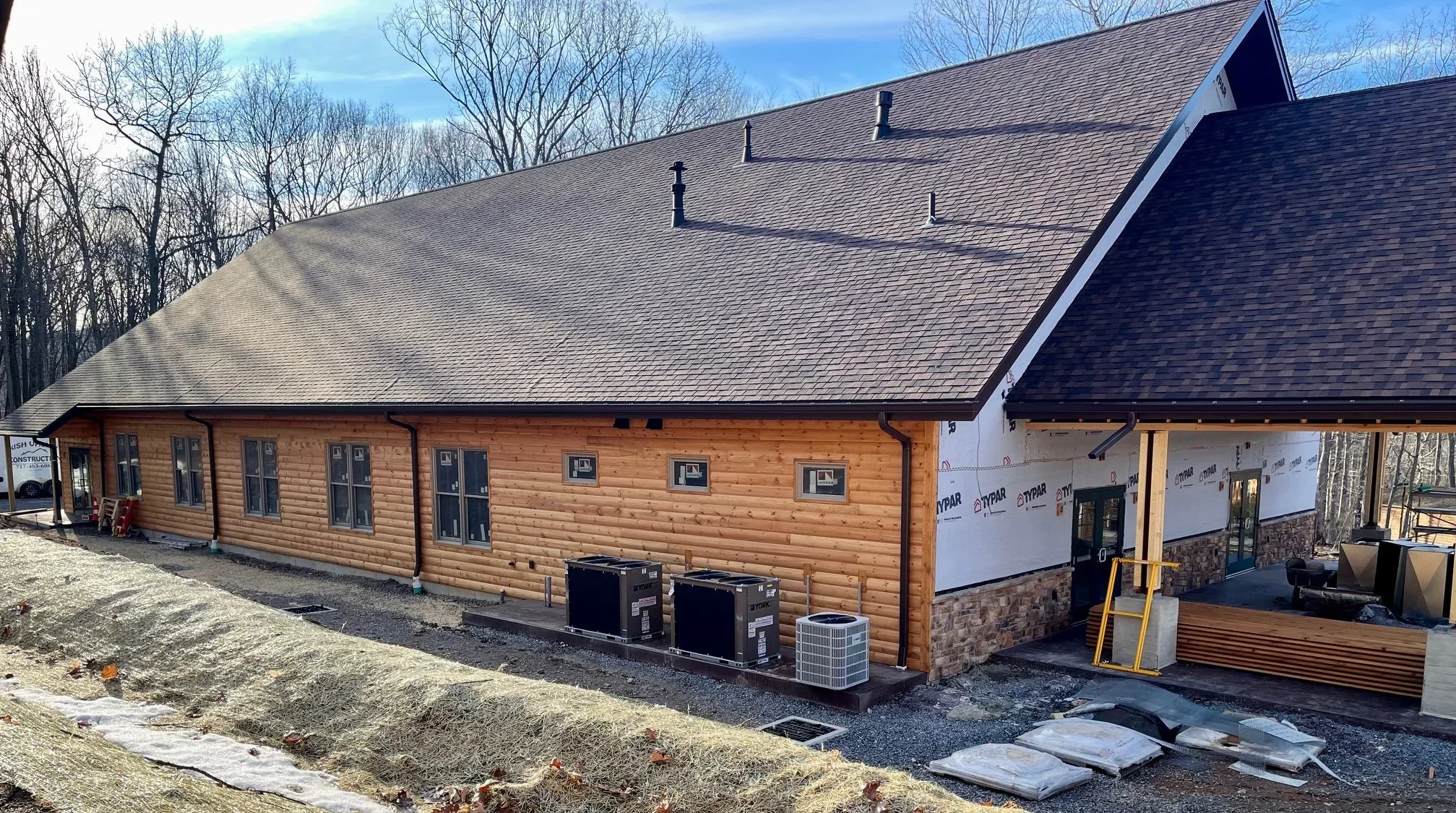 Feb. 20 - Siding along the back wall is complete
