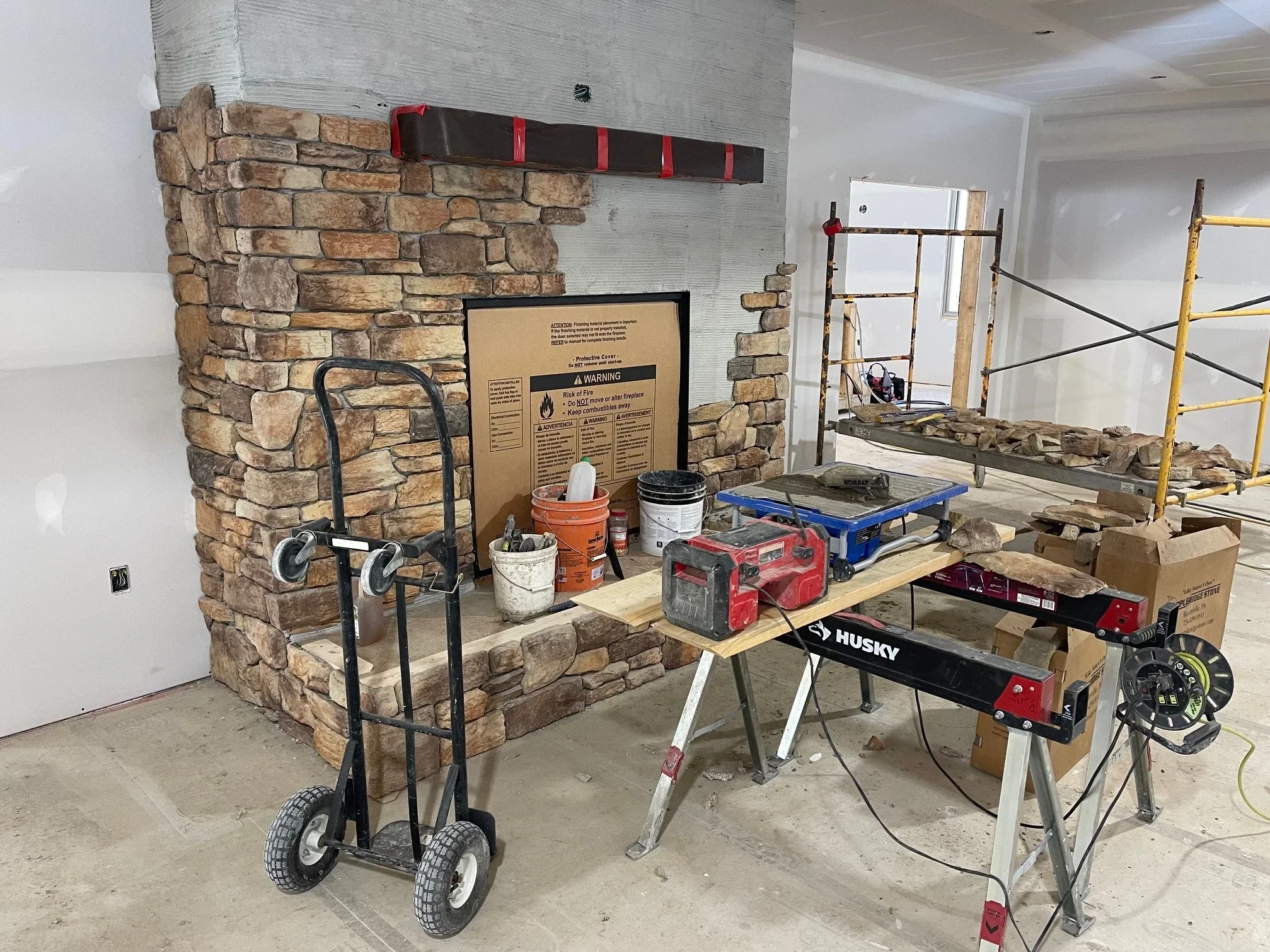 Jan. 20 - Fireplace stonework progressing