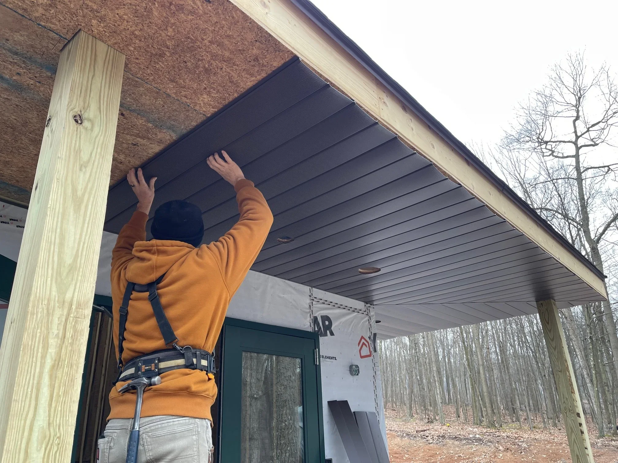 Jan. 9 - Last of the soffit going up.