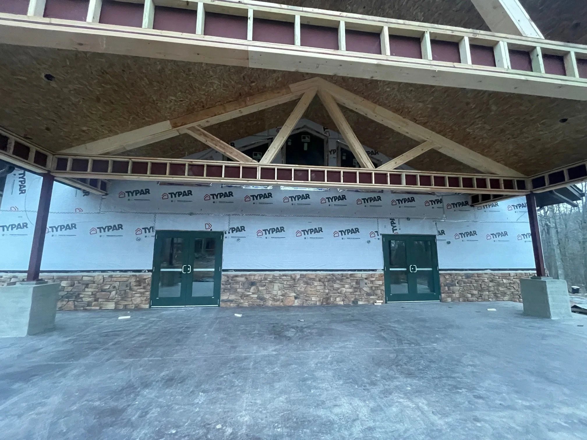 Jan. 15 - Porch beams being framed in