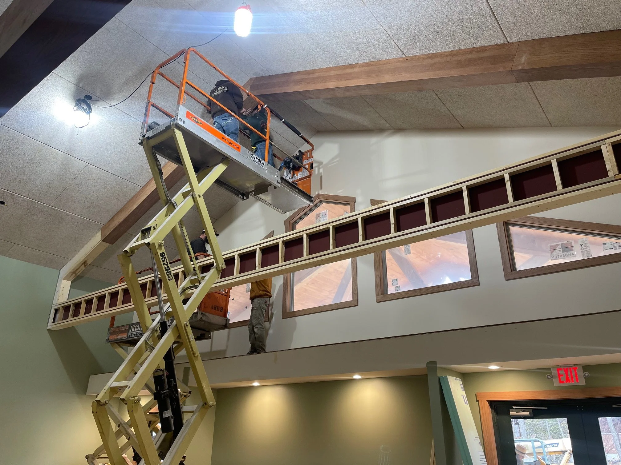 March 2 - Lobby beams being wrapped with oak