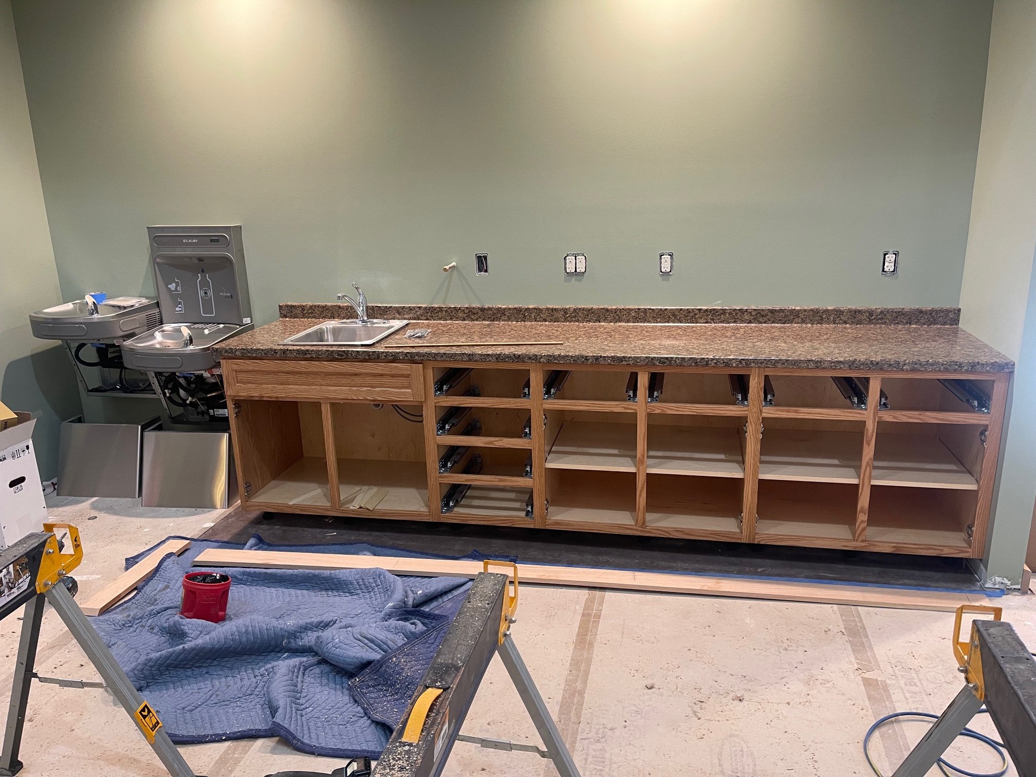 March 10 - Coffee bar cabinets installed