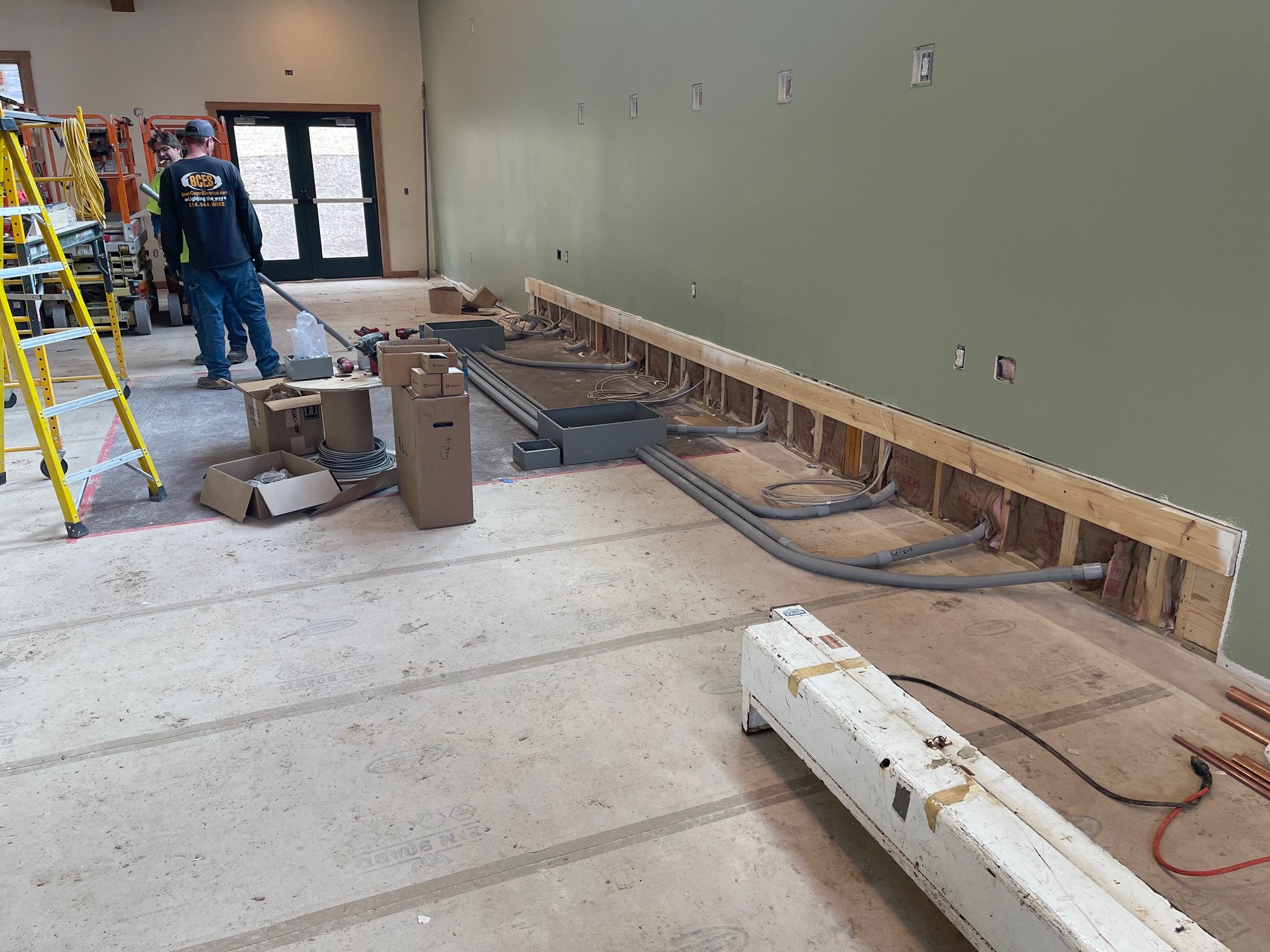 March 10 - Under stage boxes and conduits installed