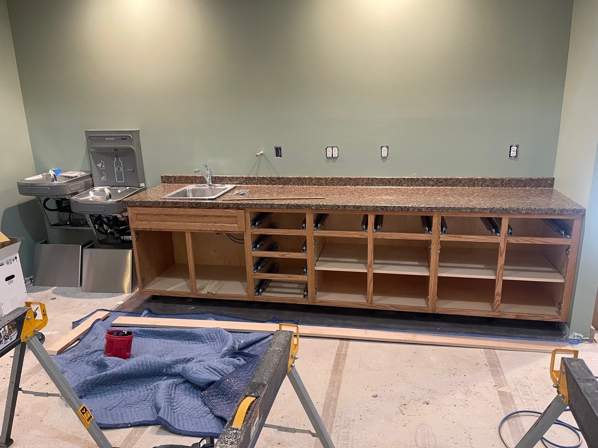 March 10 - Coffee bar cabinets installed