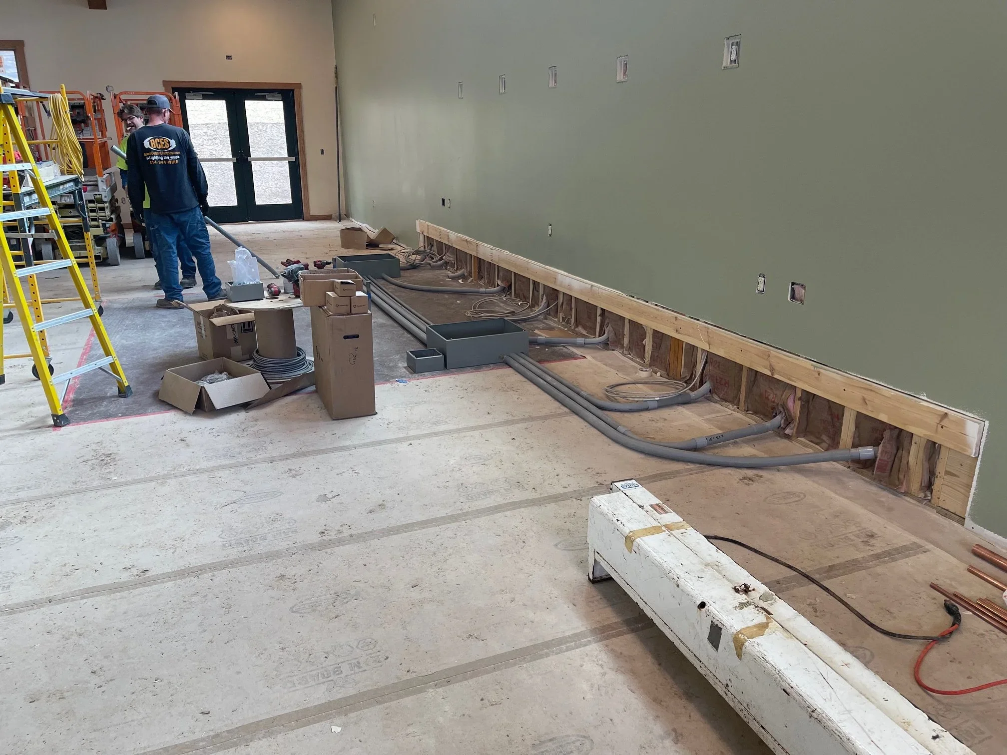 March 10 - Under stage boxes and conduits installed