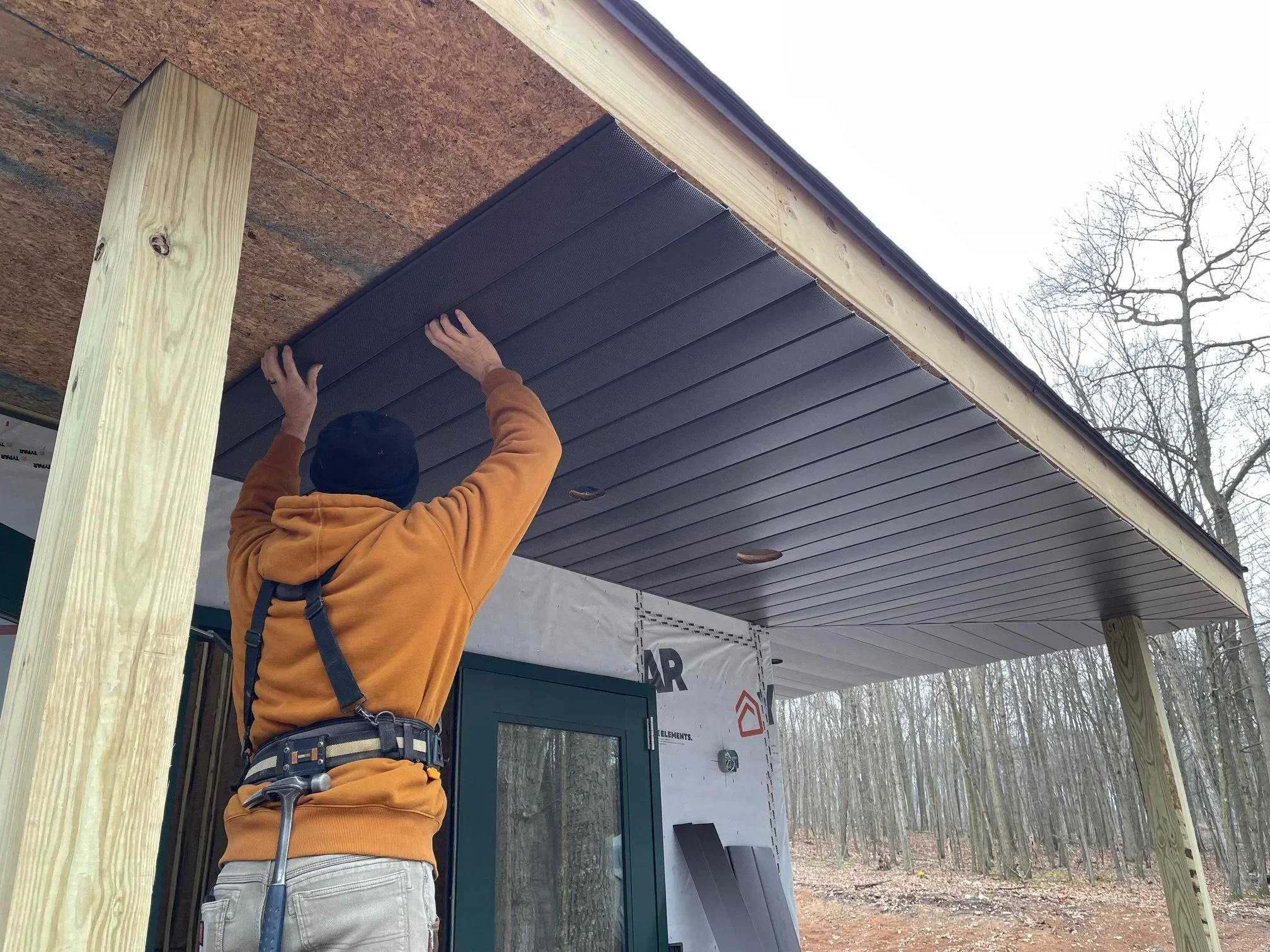 Jan. 9 - Last of the soffit going up.