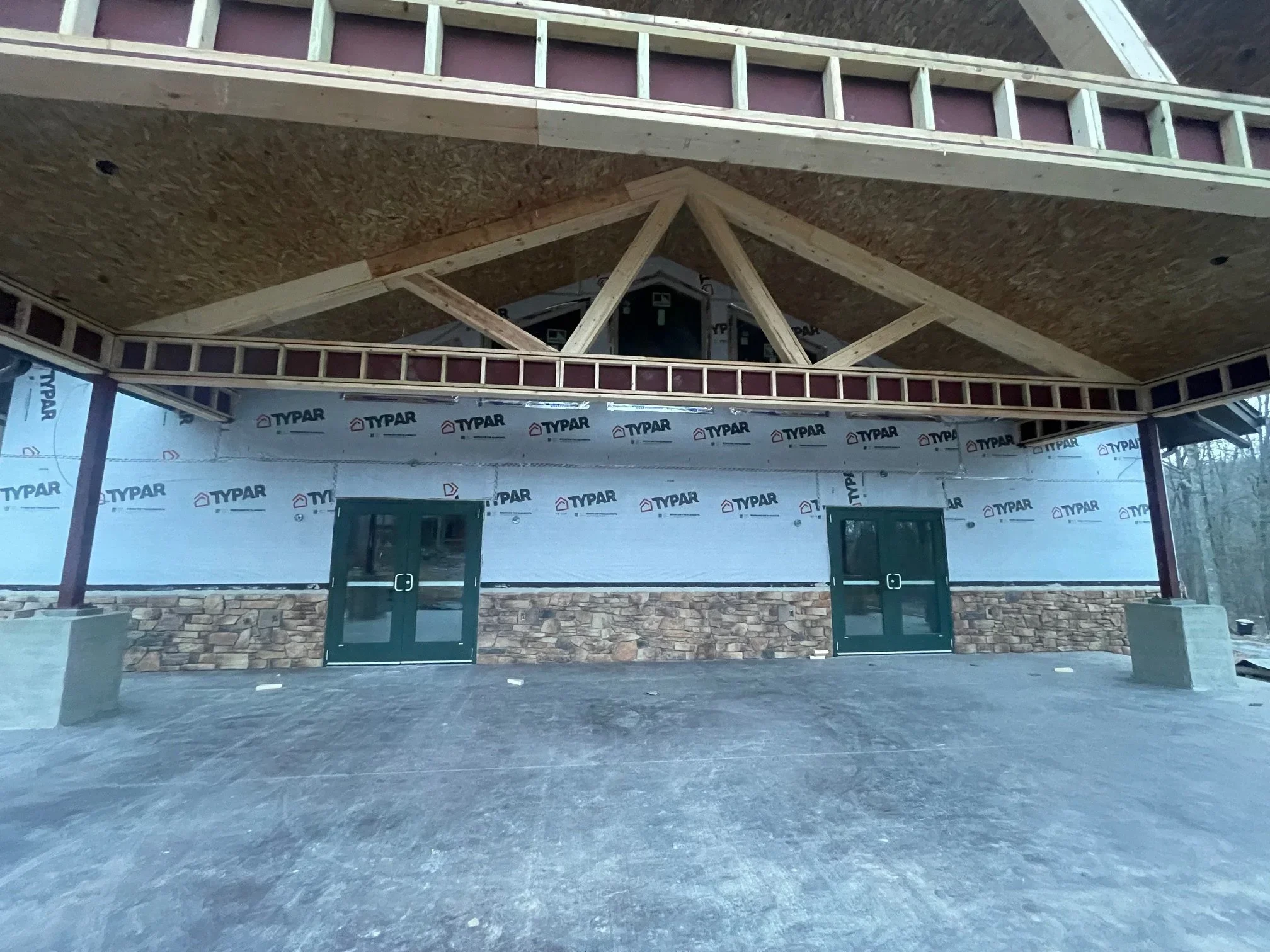 Jan. 15 - Porch beams being framed in