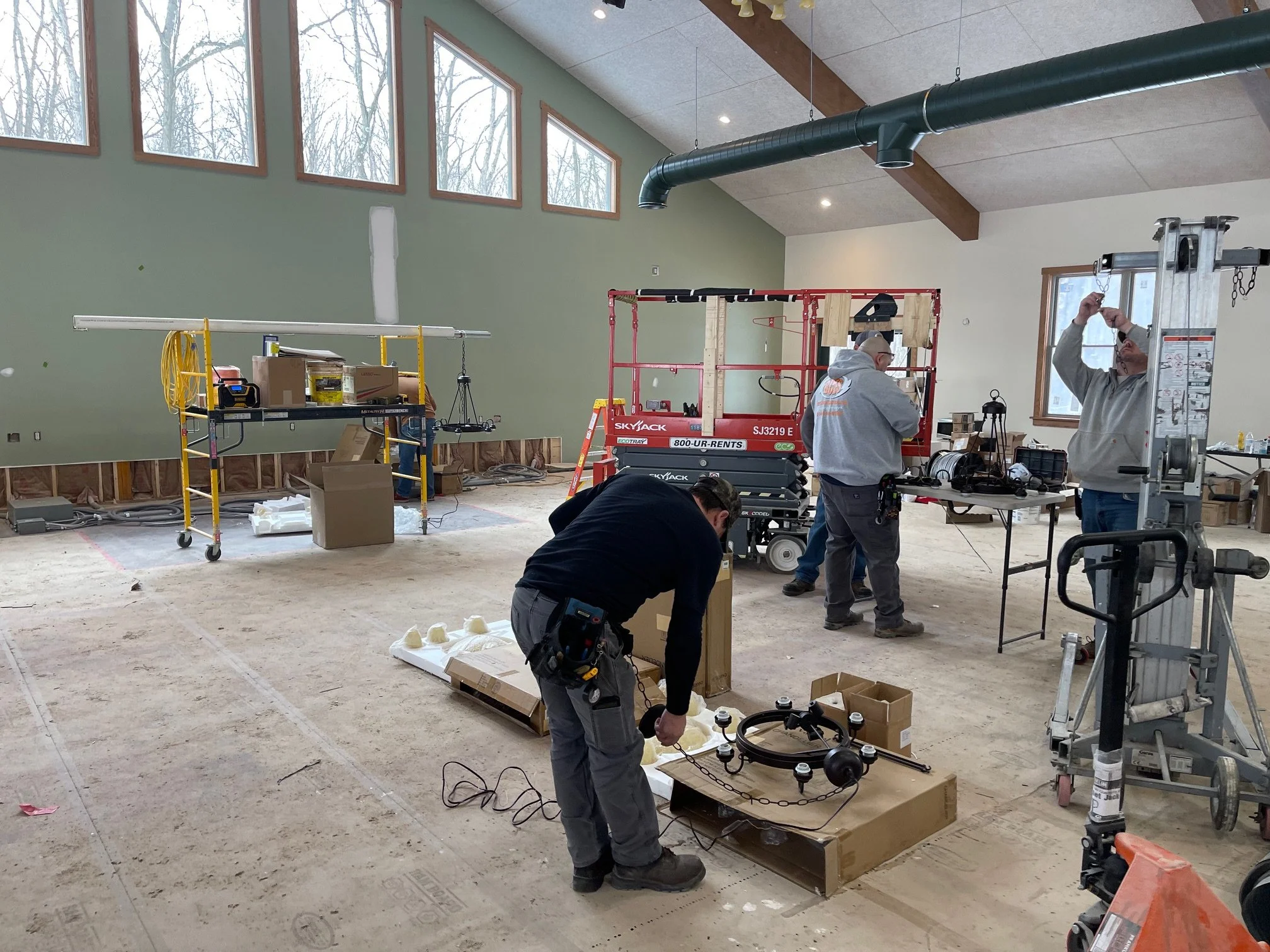 March 17 - Chandeliers being assembled