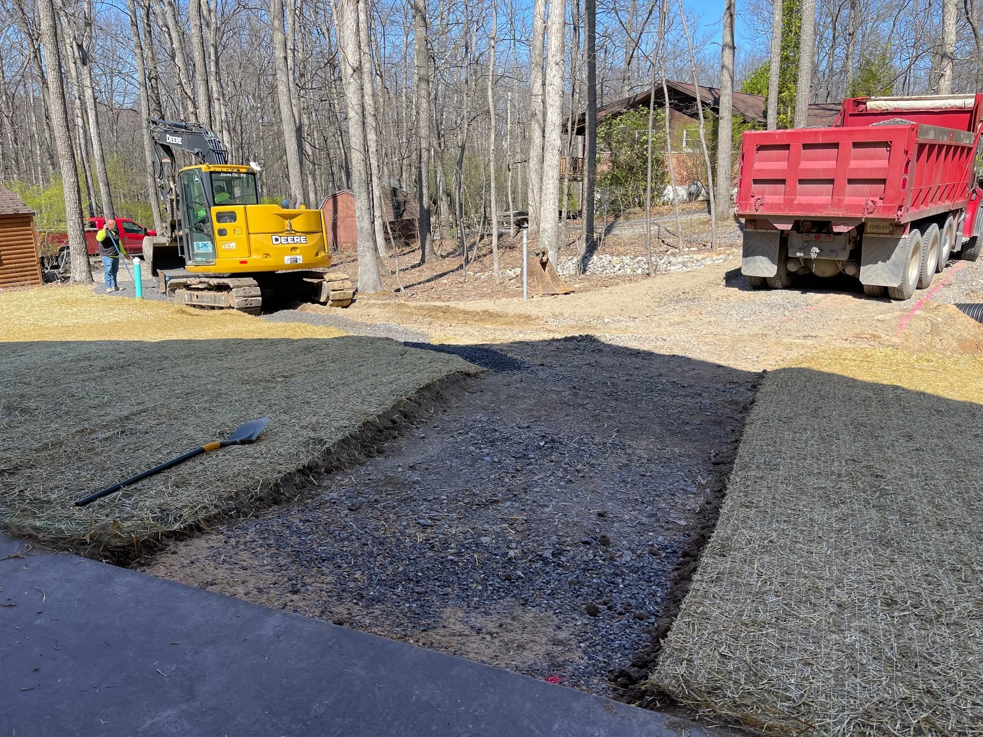 April 8th - Final topsoil and grass planted, pathways began.