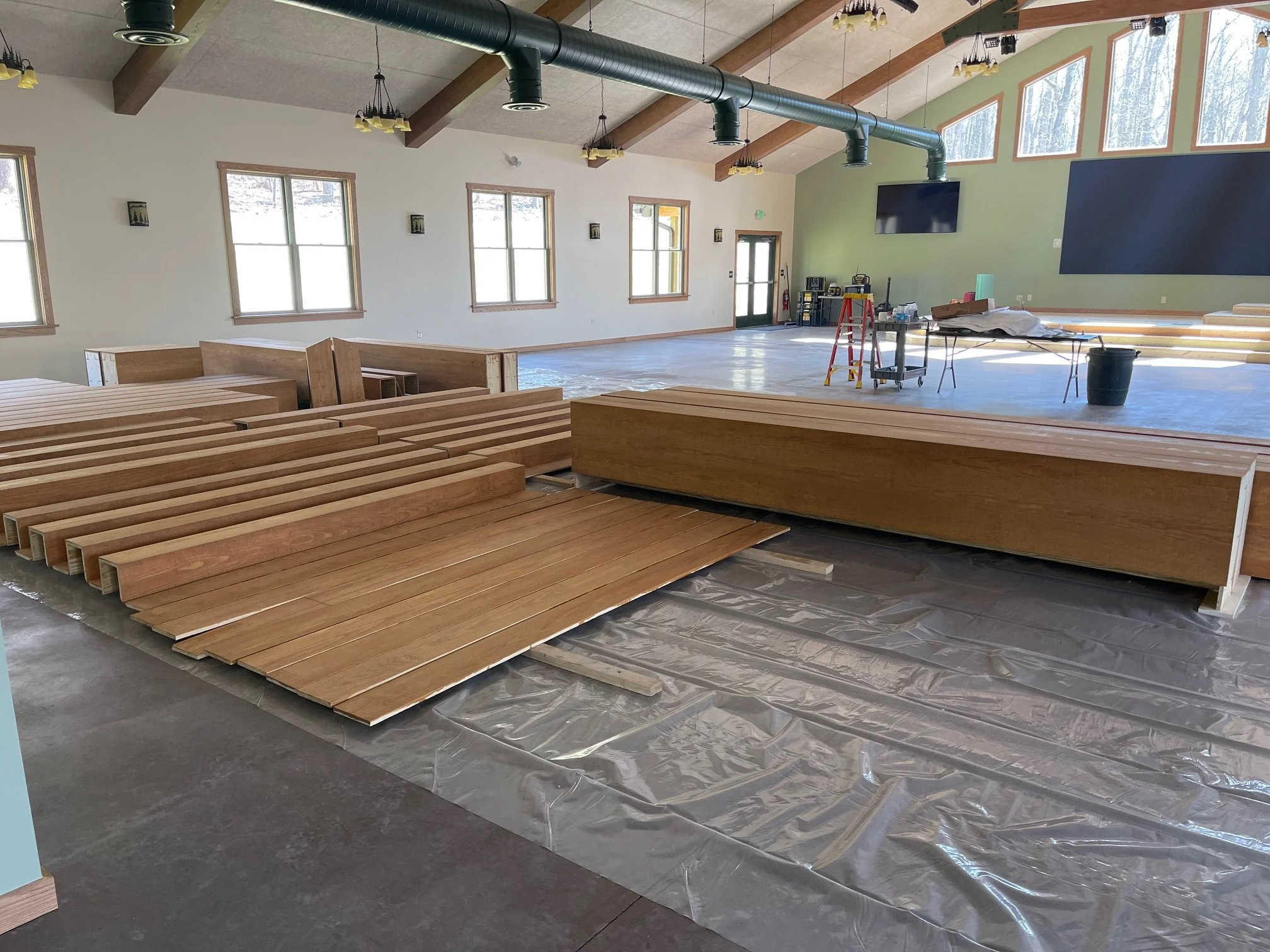 April 10 - Re-sawn pine for porch beams stained