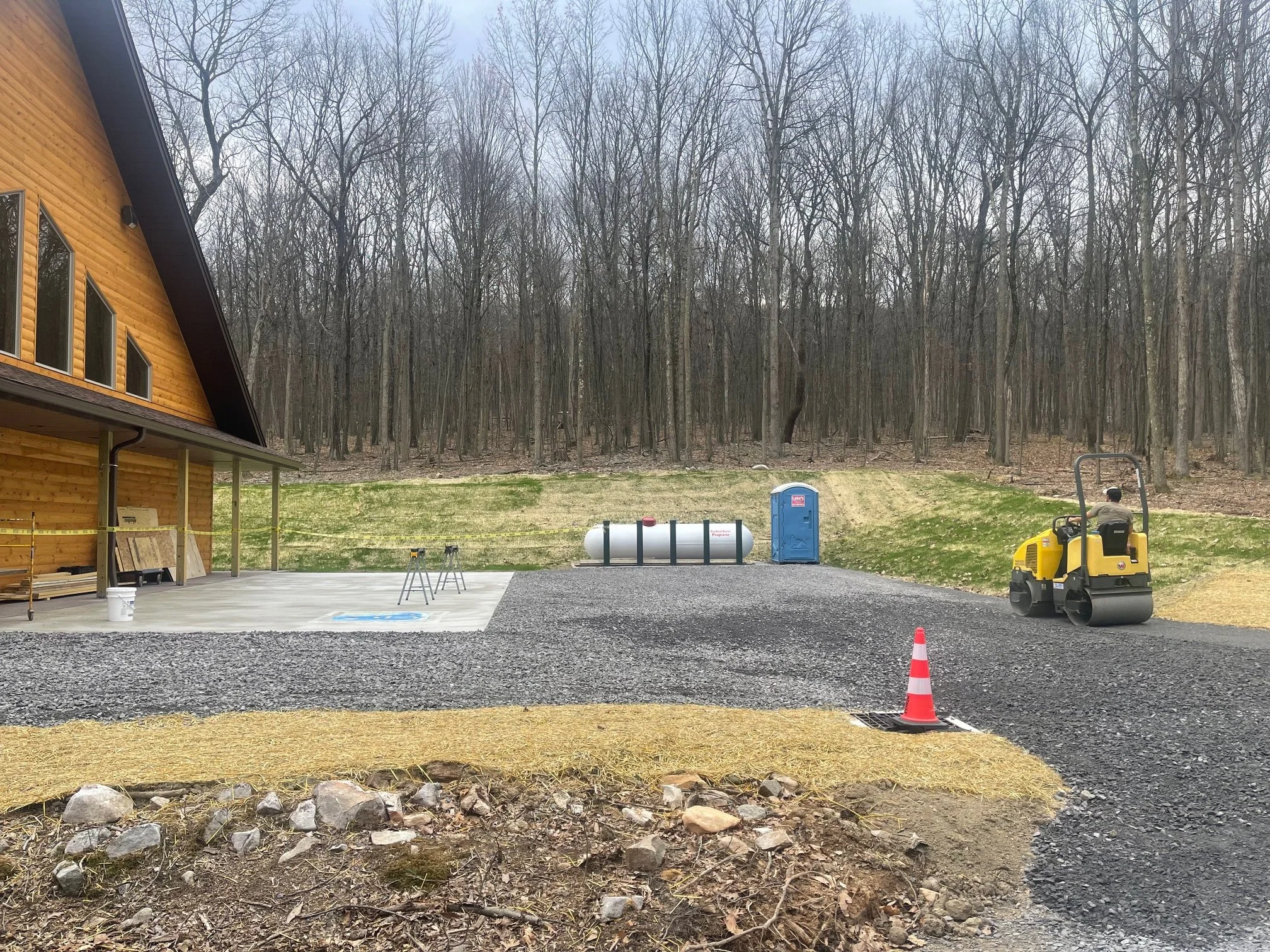 April 13 - ADA parking lines painted and stone spread