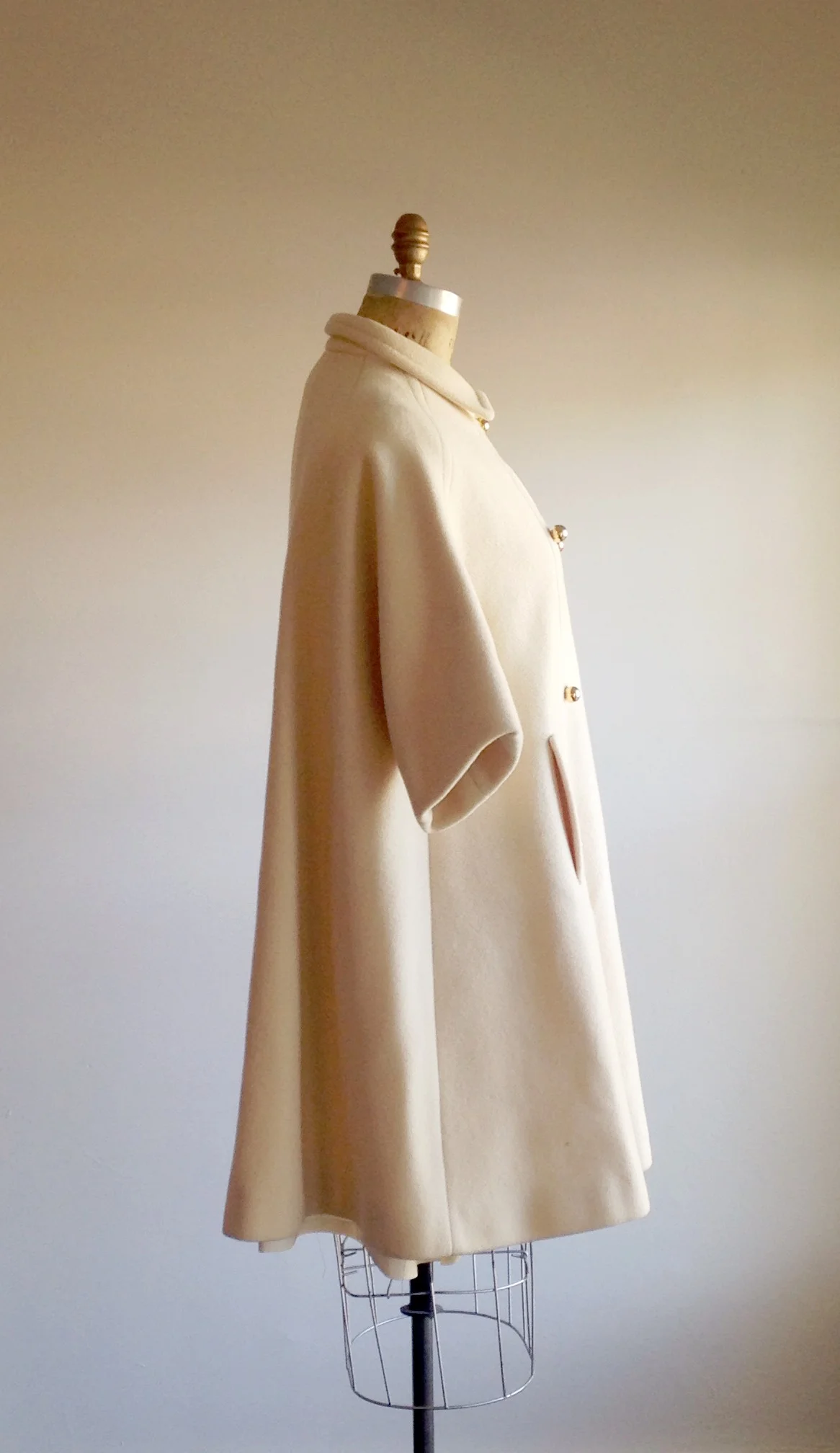 white swing coat