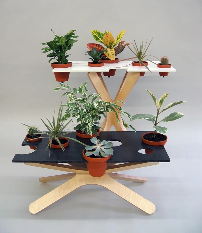   Erb Table   Birch Plywood + Corian 17”H or 30”H X 31”W X 15”D  The base is adaptable and can be set-up vertically or horizontally.&nbsp; 