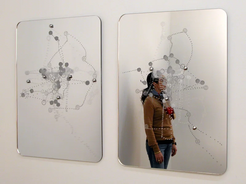  Strangers Mirrors   Laser Cut + Etched Acrylic Mirror + Chrome Mirror Screws 16.5”W X 23” H X 1/4” Thick  First edition available through  Devening Projects   The intricate surface patterns etched into the front and the back of the mirrors are visu