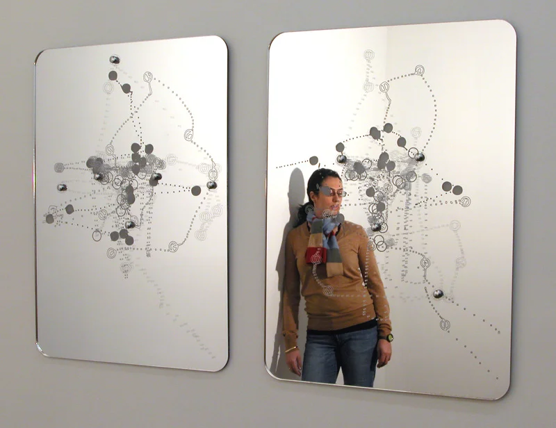   Strangers Mirrors   Laser Cut + Etched Acrylic Mirror + Chrome Mirror Screws 16.5”W X 23” H X 1/4” Thick  First edition available through  Devening Projects   The intricate surface patterns etched into the front and the back of the mirrors are visu