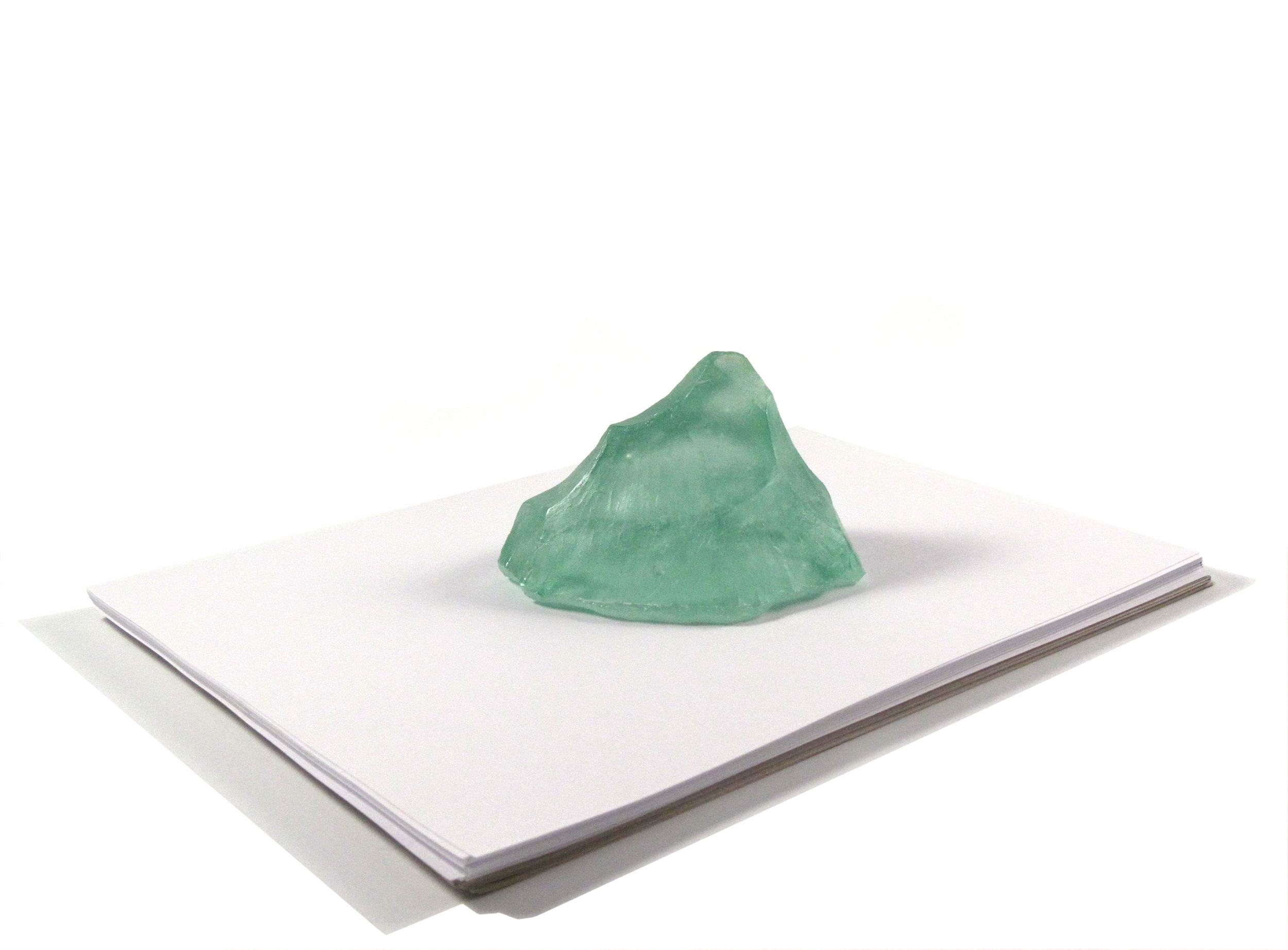   Munro Series - Glacier  Paperweight  Cast glass 4.25” L X 3.25” H X 3.25” D  Only one cast is made from each hand modeled clay form, making every Munro in the series unique. 